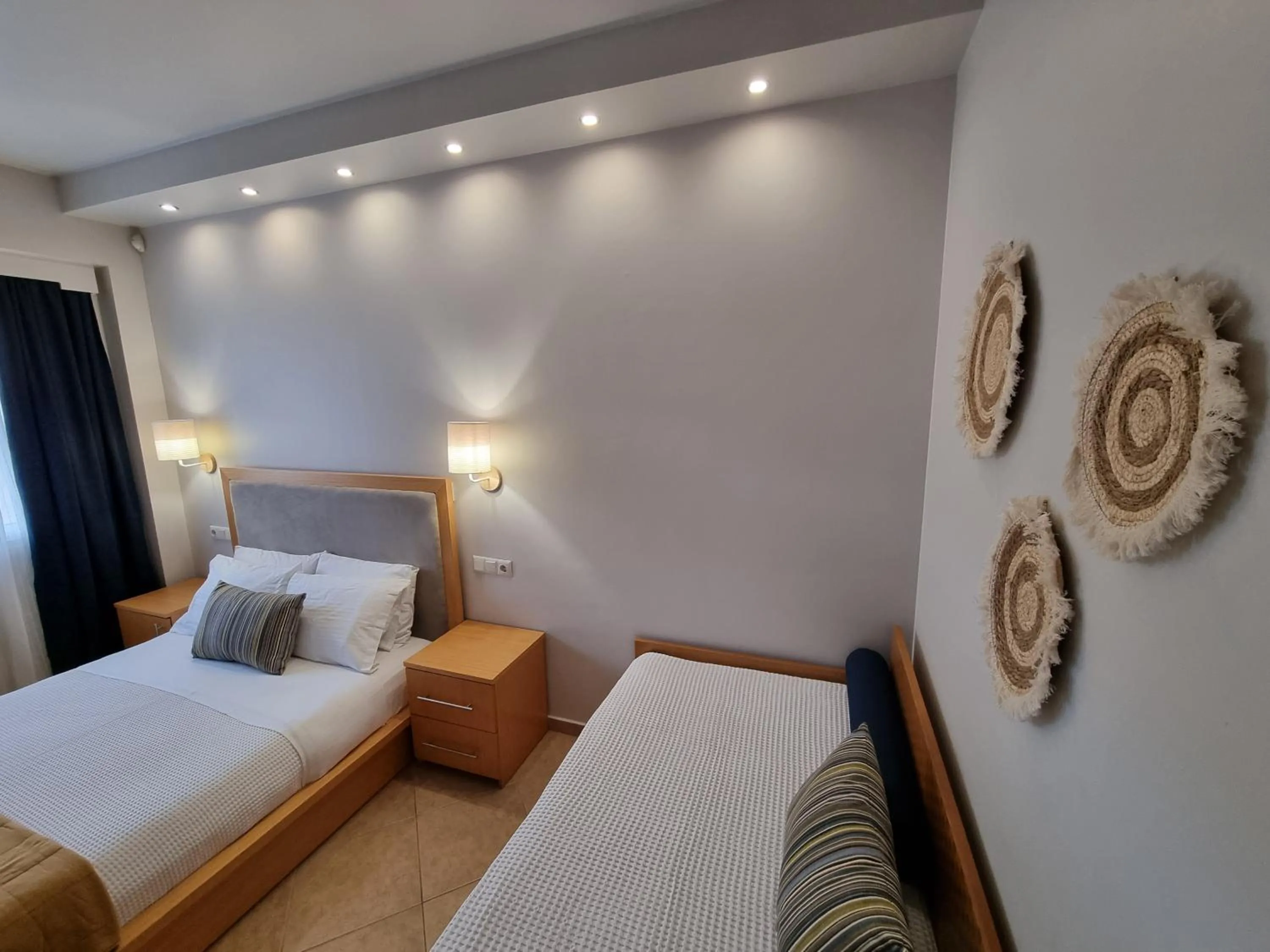 Bed in GreenHill Holiday Suites