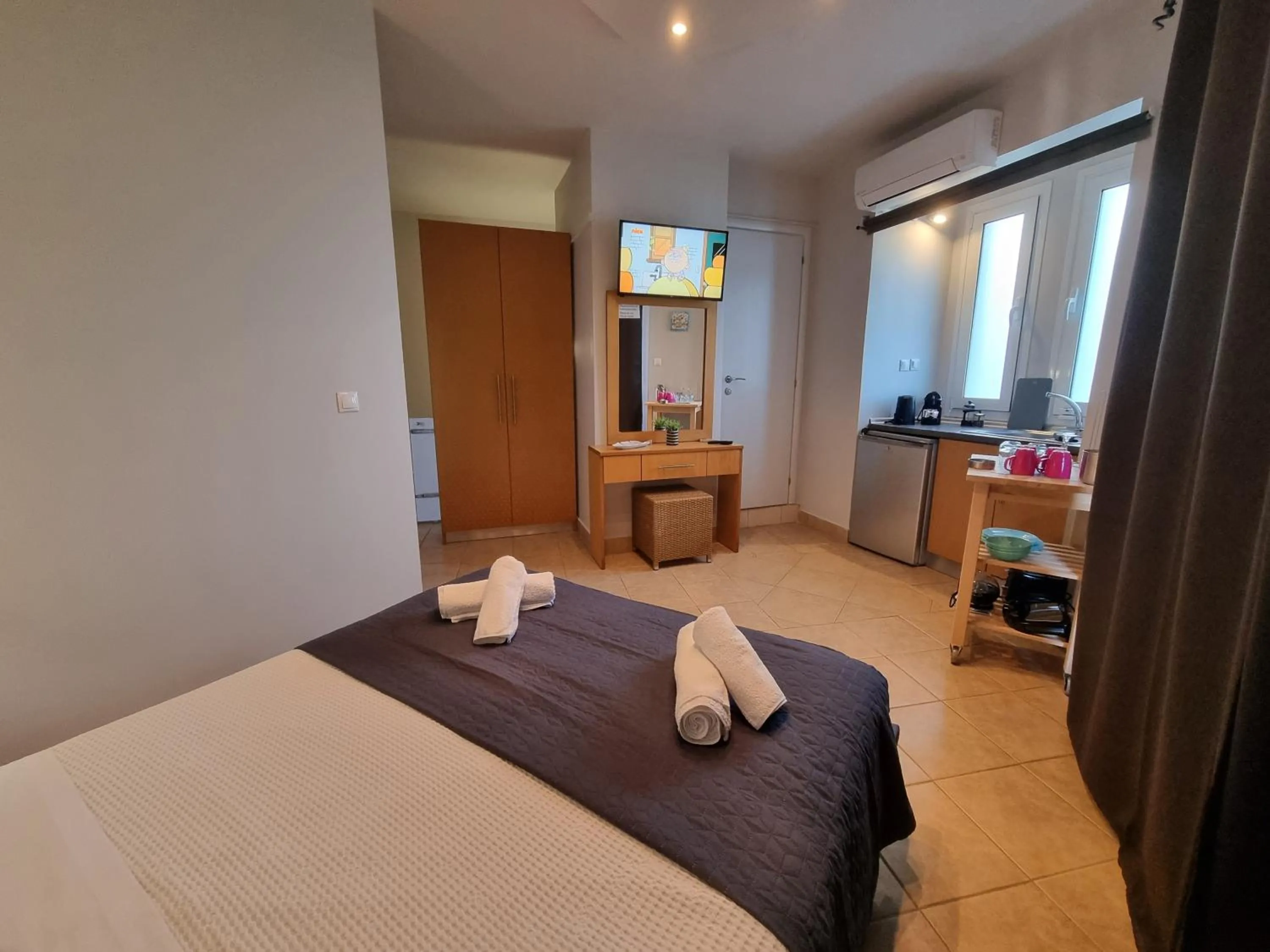 Bed in GreenHill Holiday Suites