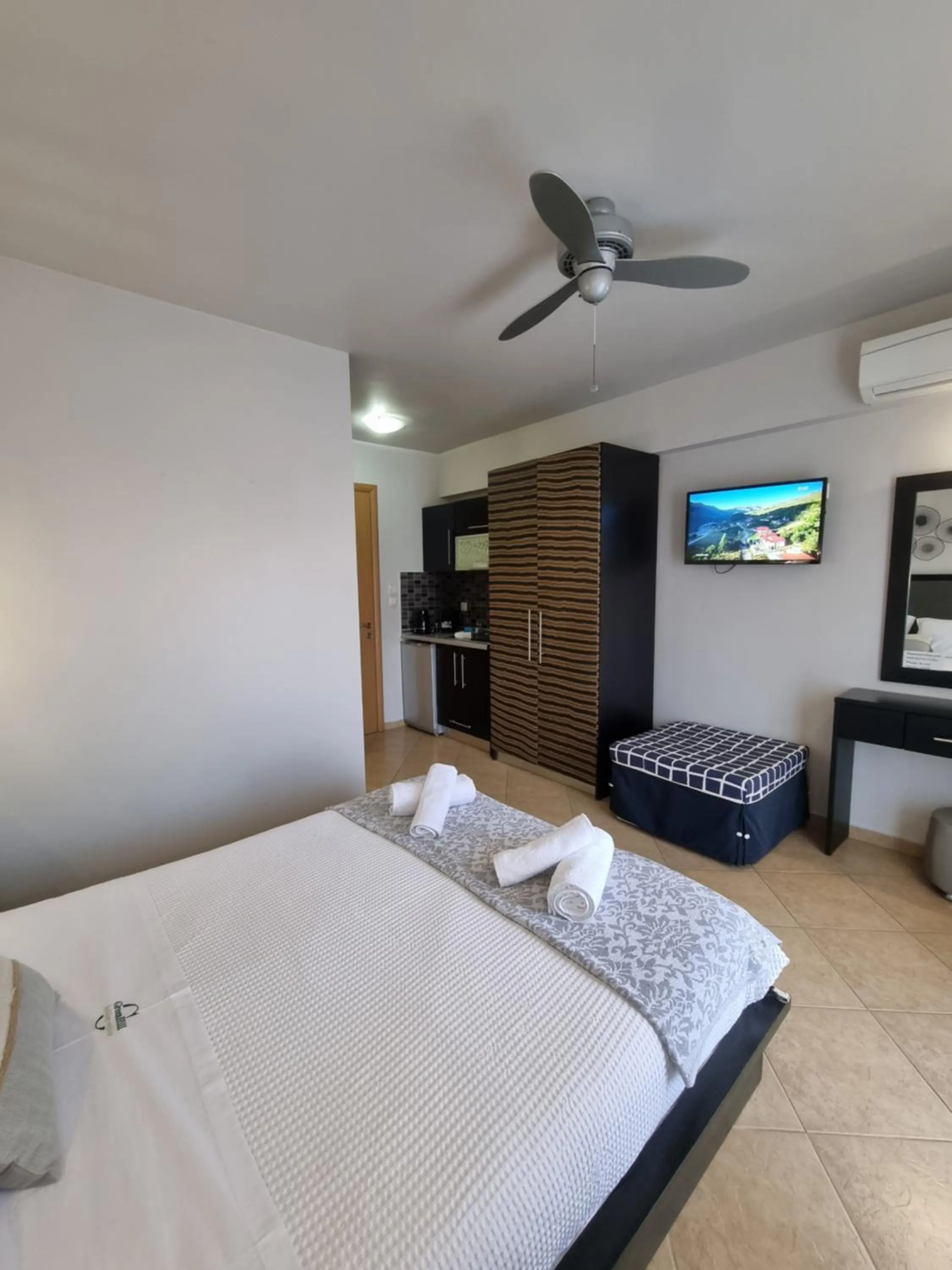 Bed in GreenHill Holiday Suites