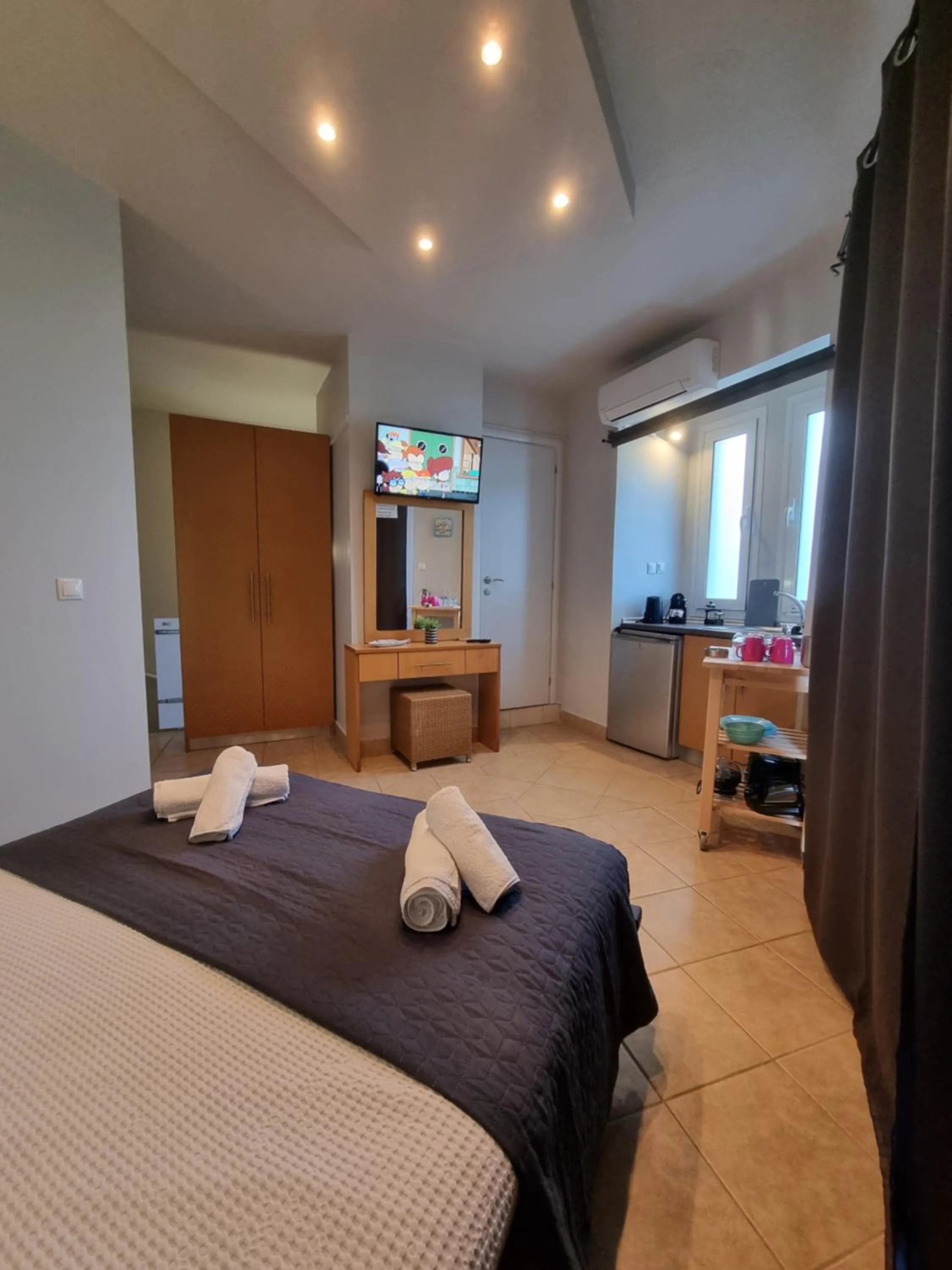 Bed in GreenHill Holiday Suites
