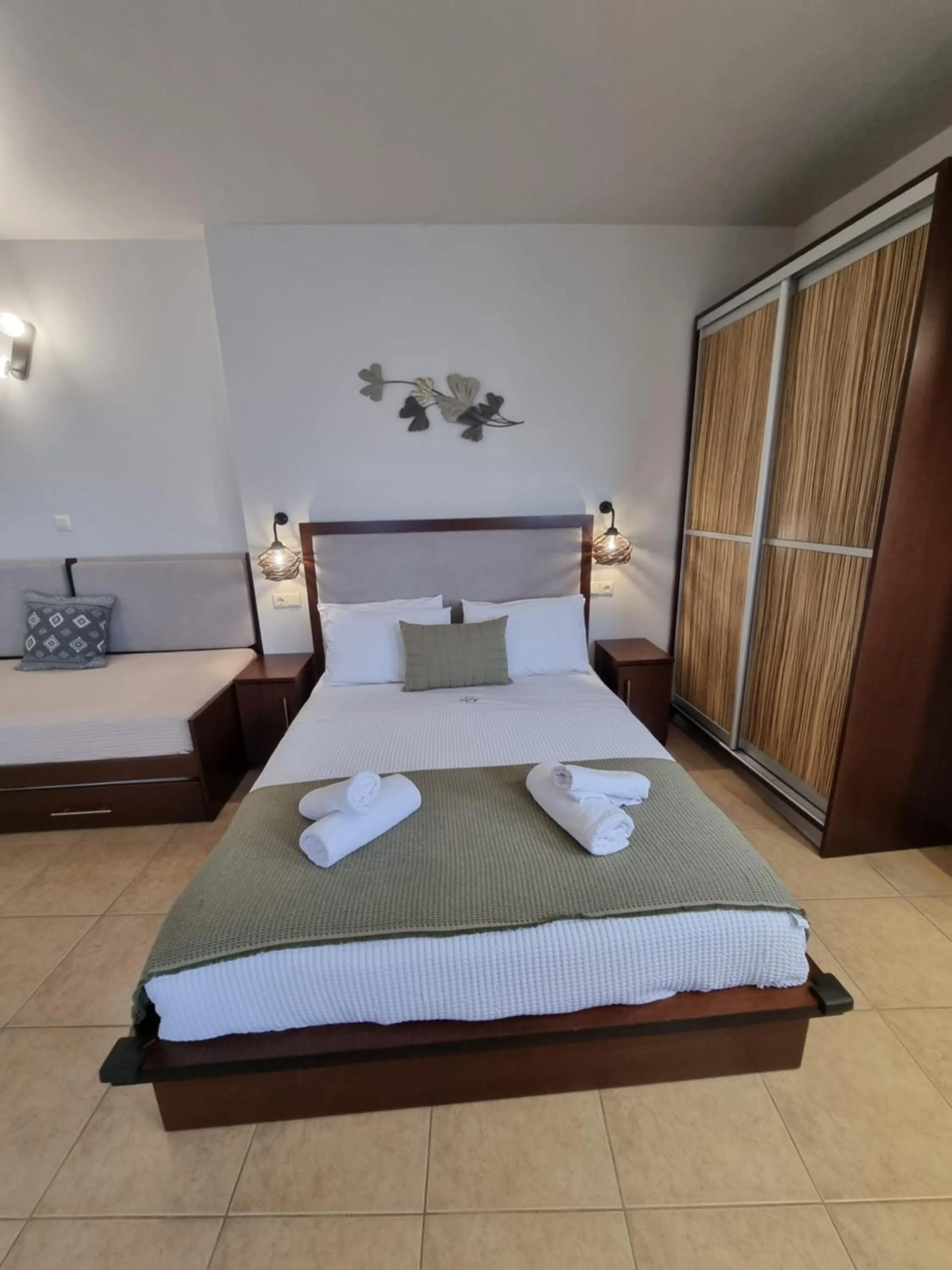 Bed in GreenHill Holiday Suites