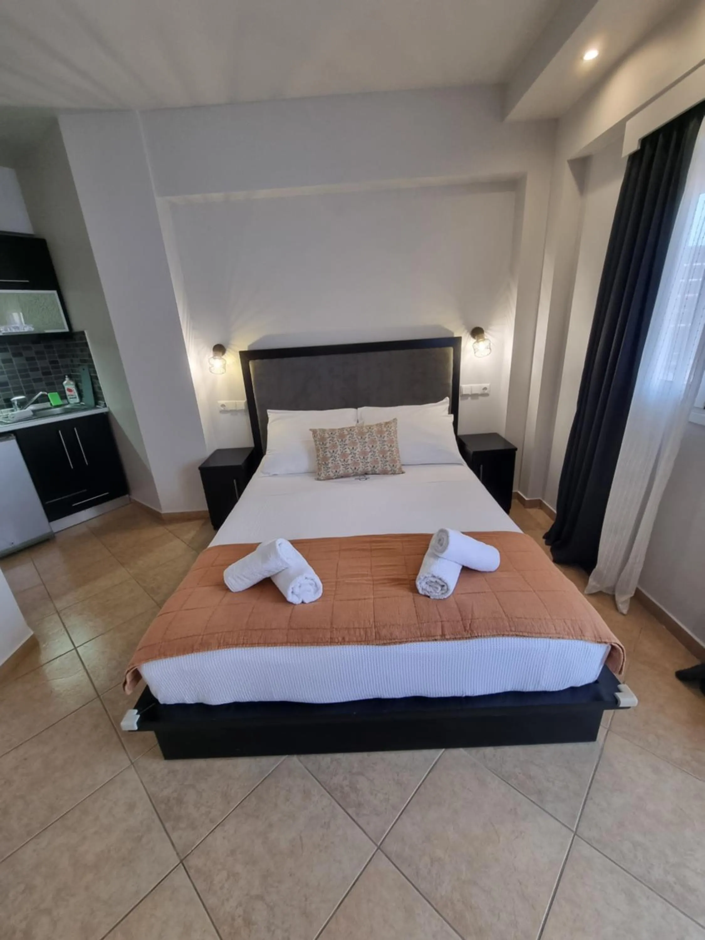 Bed in GreenHill Holiday Suites