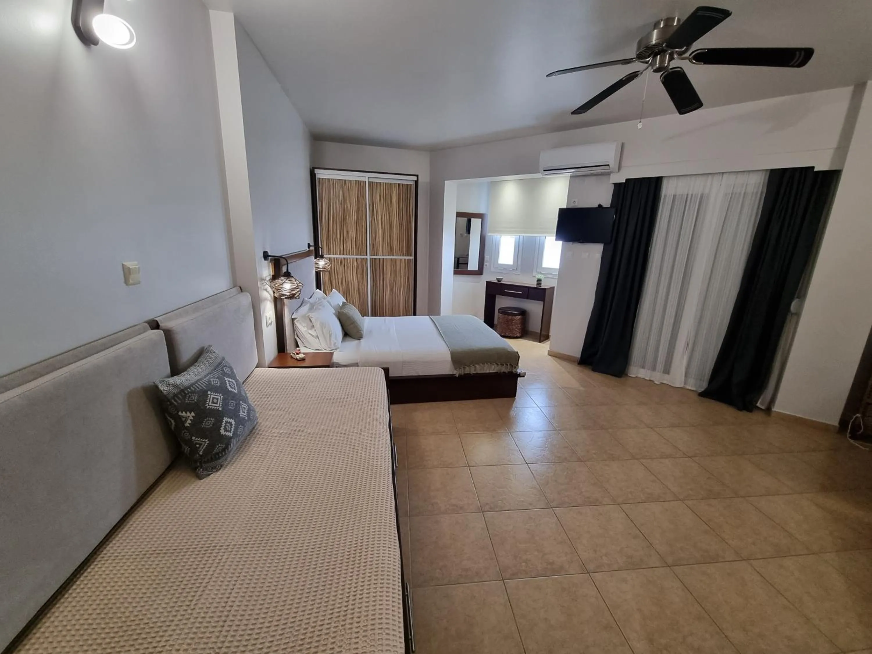 Bed in GreenHill Holiday Suites