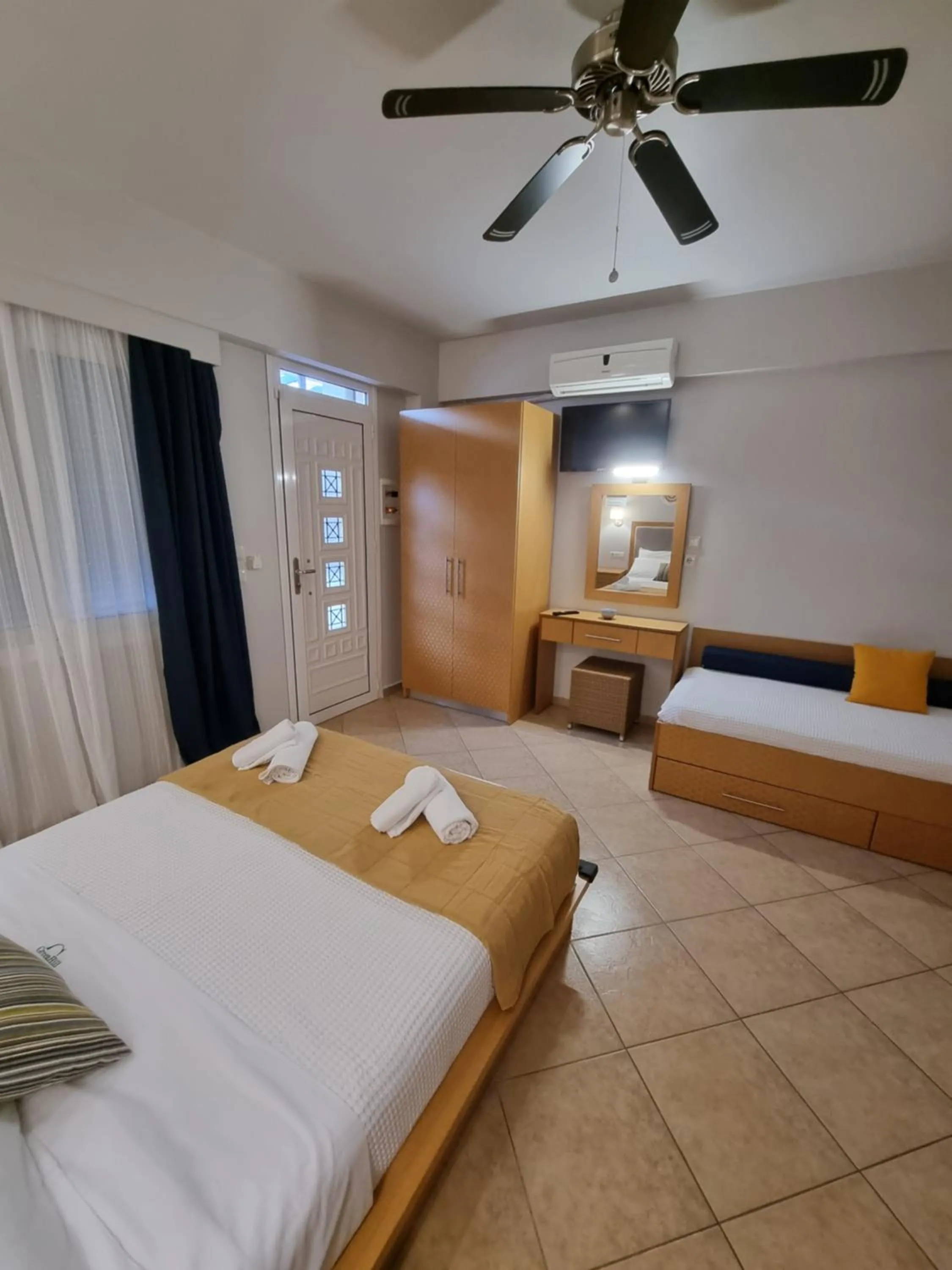 Bed in GreenHill Holiday Suites