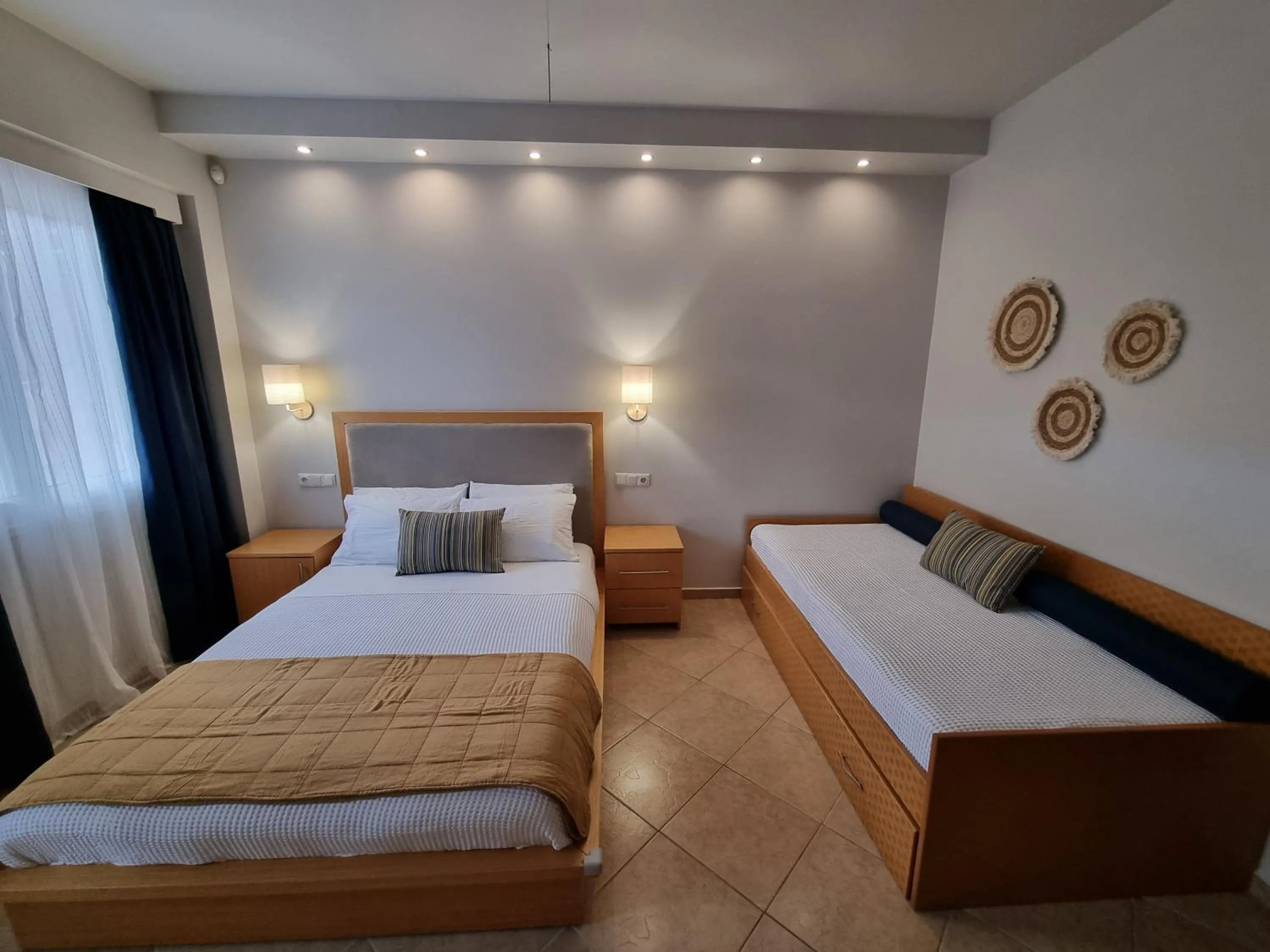 Bed in GreenHill Holiday Suites