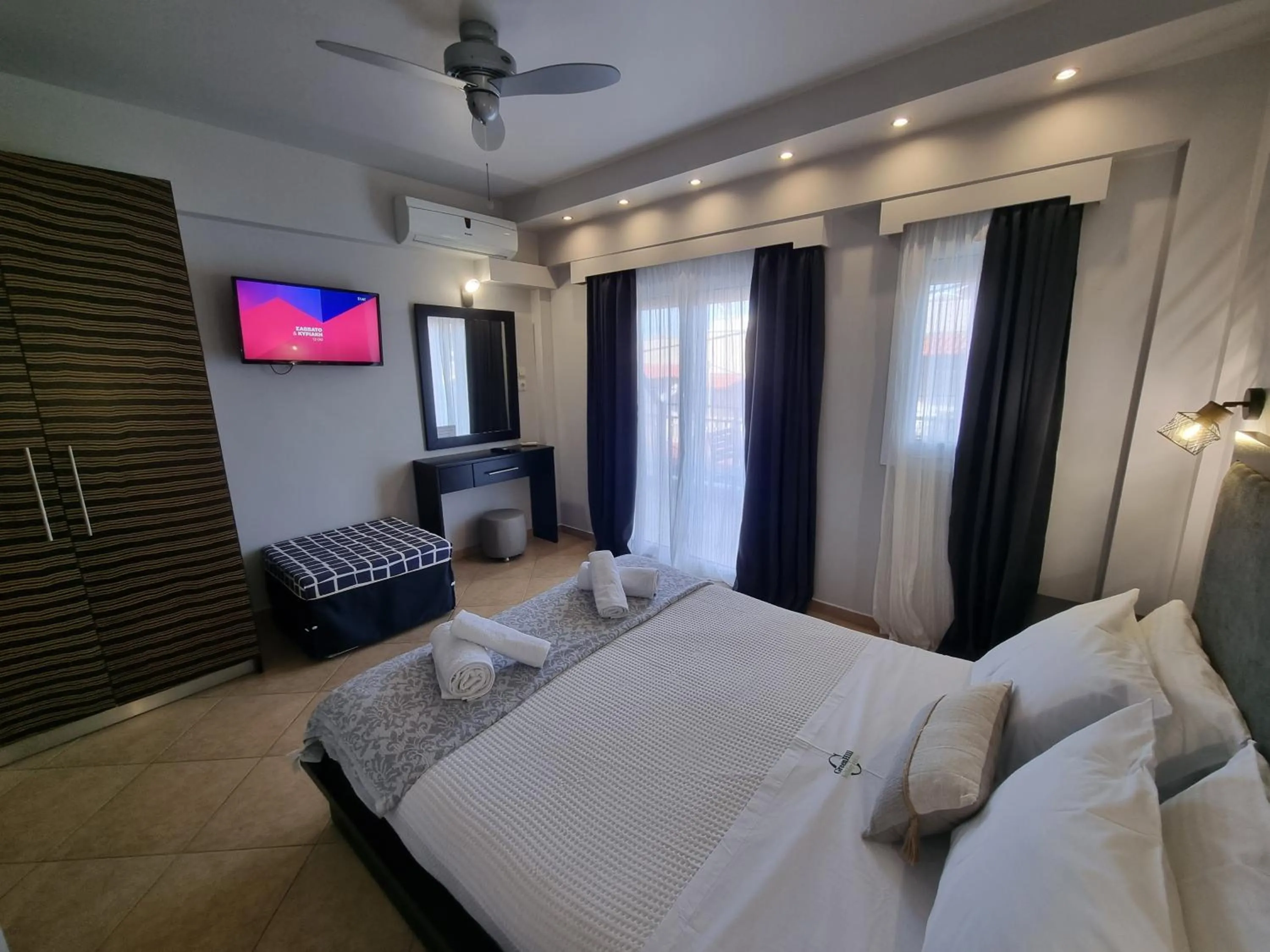 Bed in GreenHill Holiday Suites