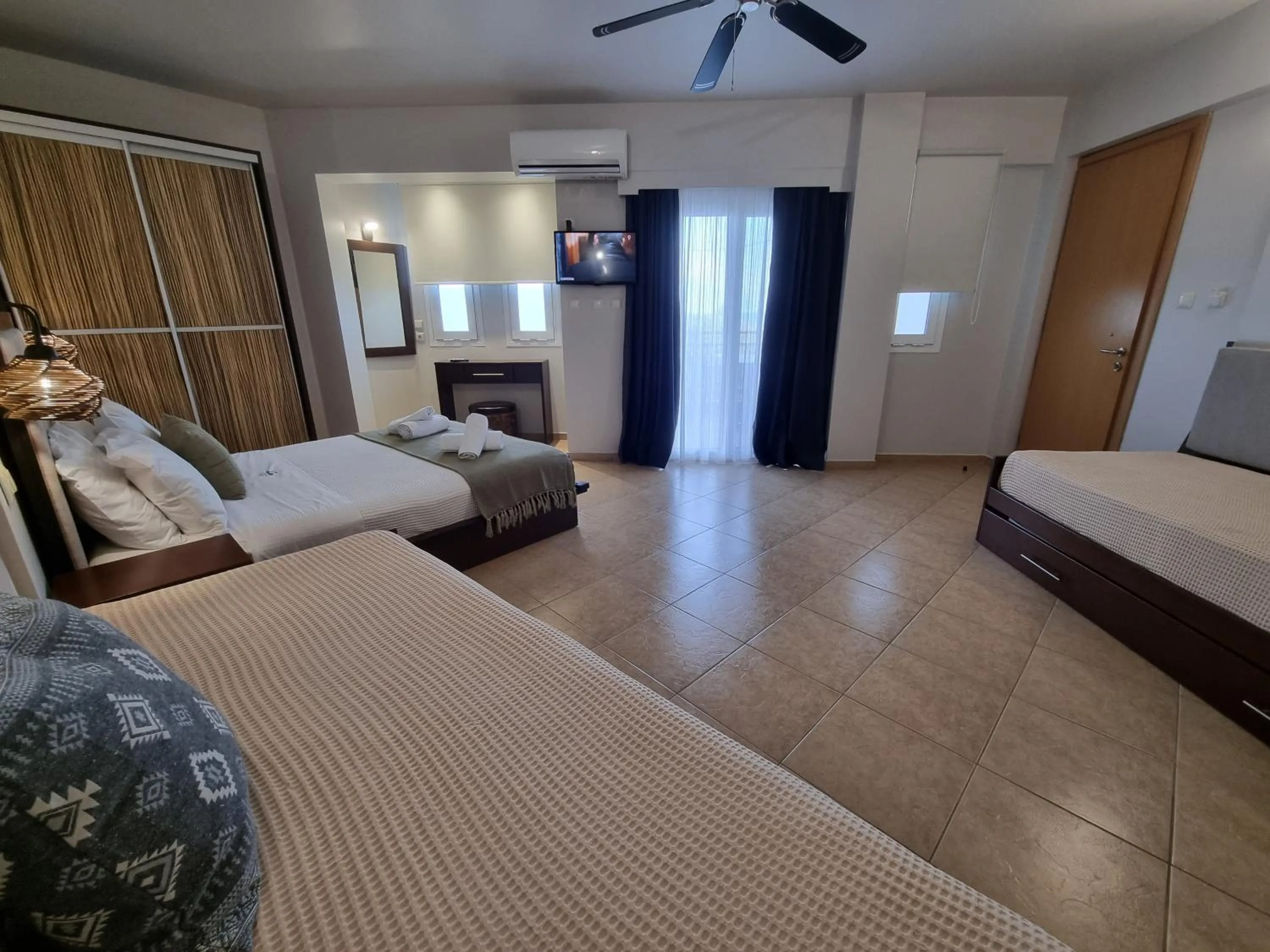 Bed in GreenHill Holiday Suites