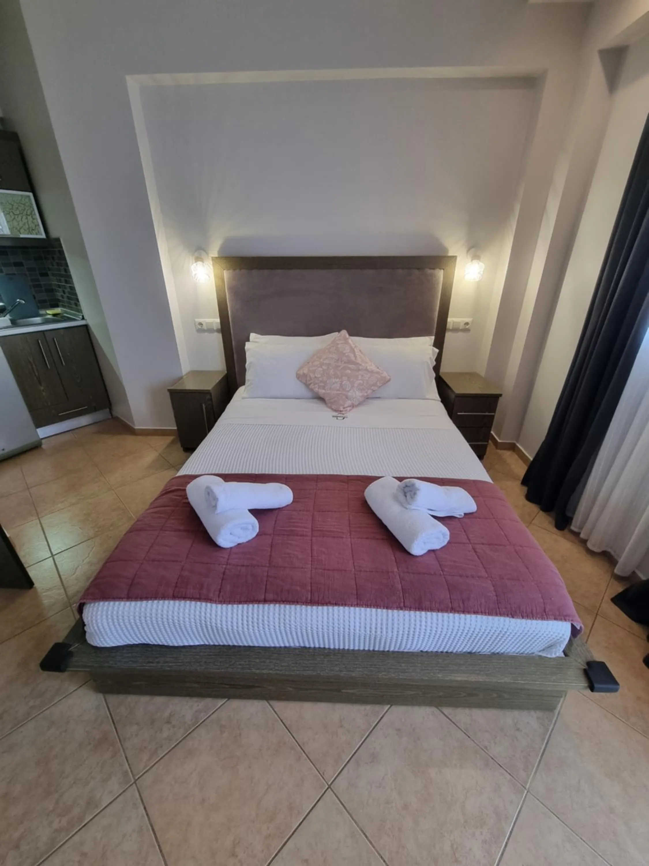 Bed in GreenHill Holiday Suites