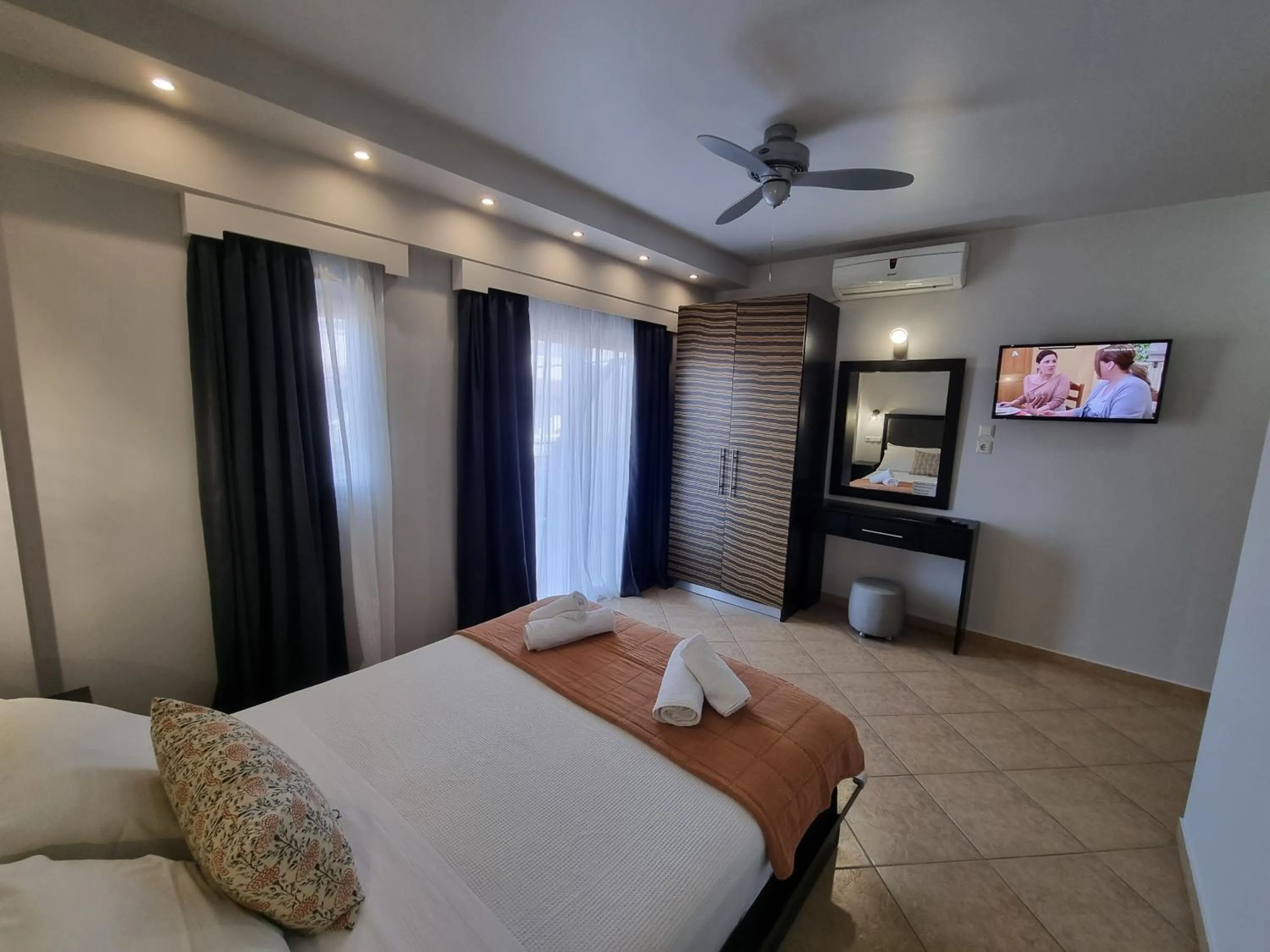 Bed in GreenHill Holiday Suites