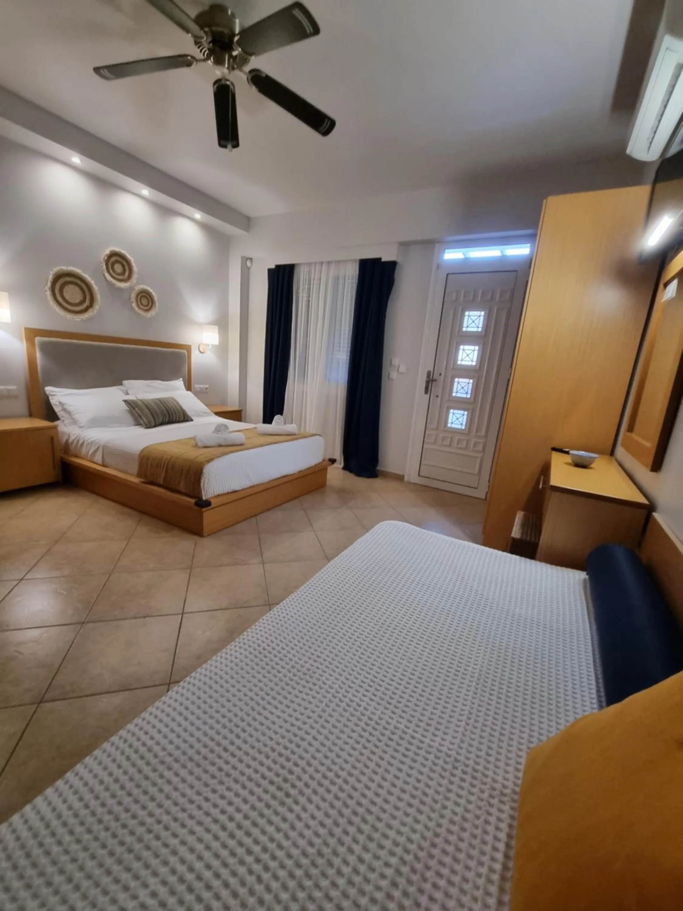 Bed in GreenHill Holiday Suites