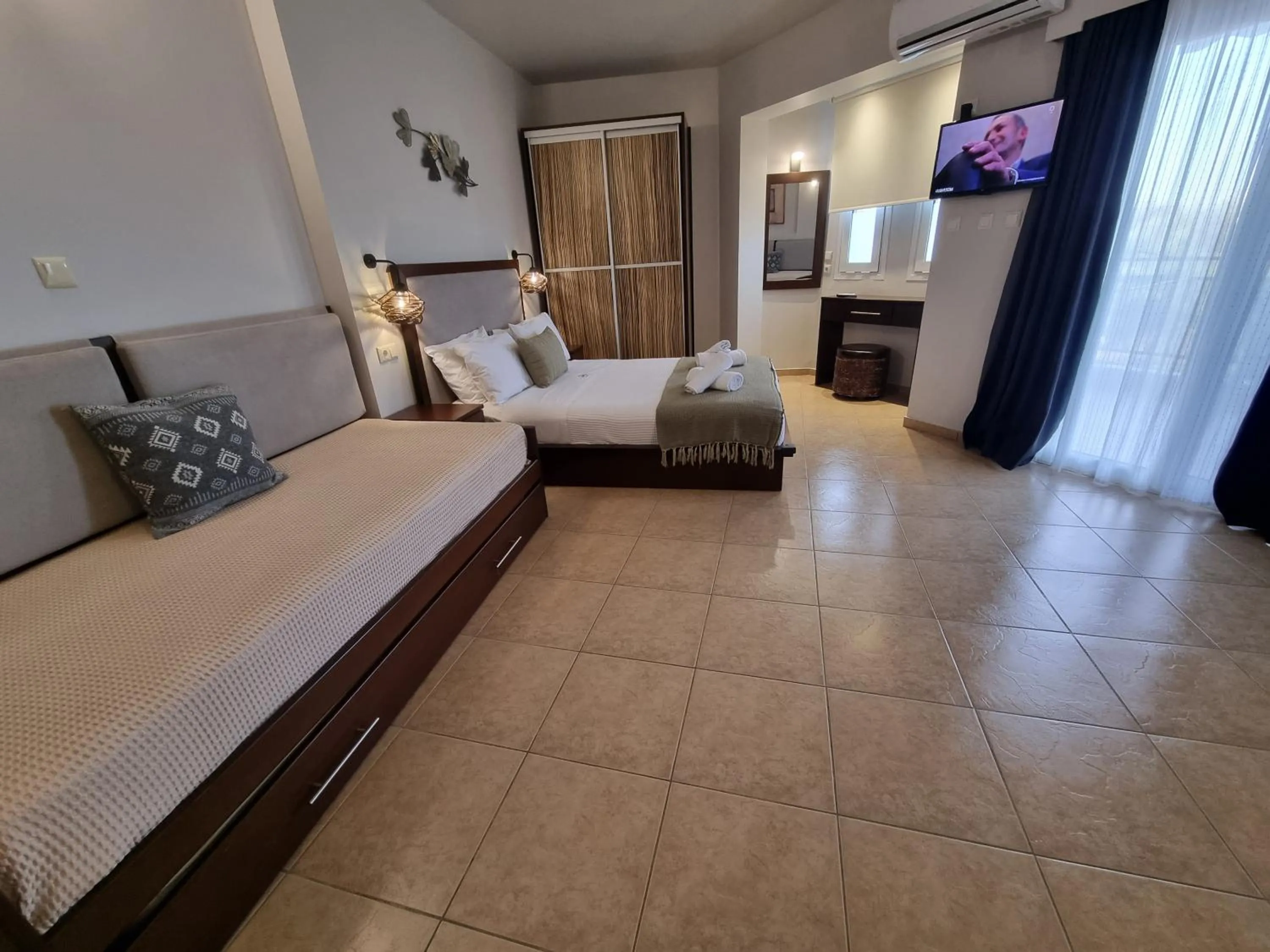 Bed in GreenHill Holiday Suites