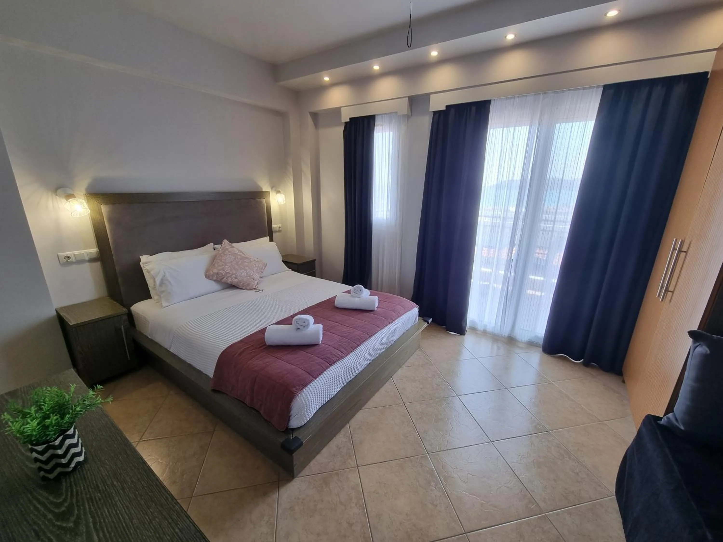 Bed in GreenHill Holiday Suites