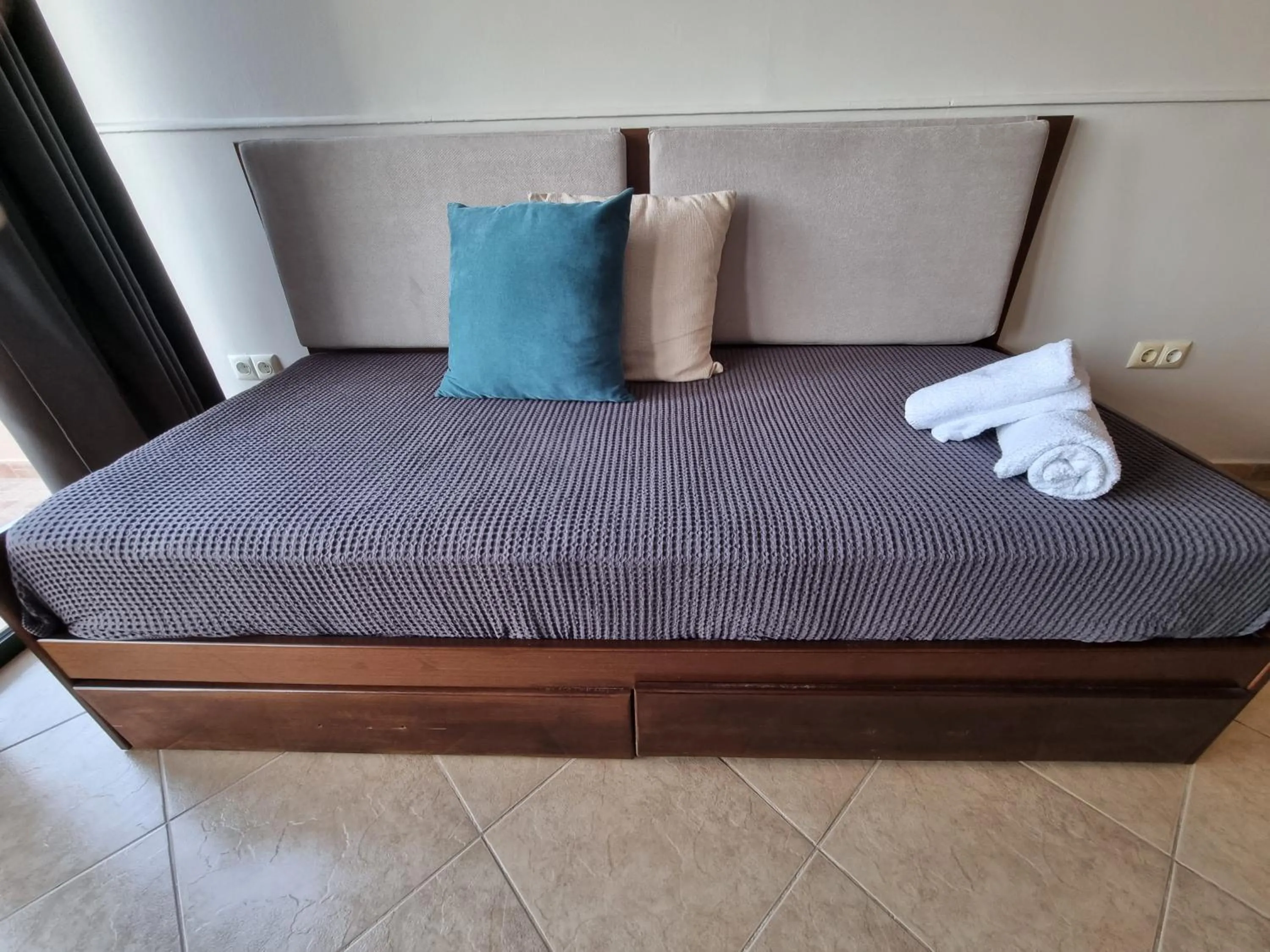 Bed in GreenHill Holiday Suites