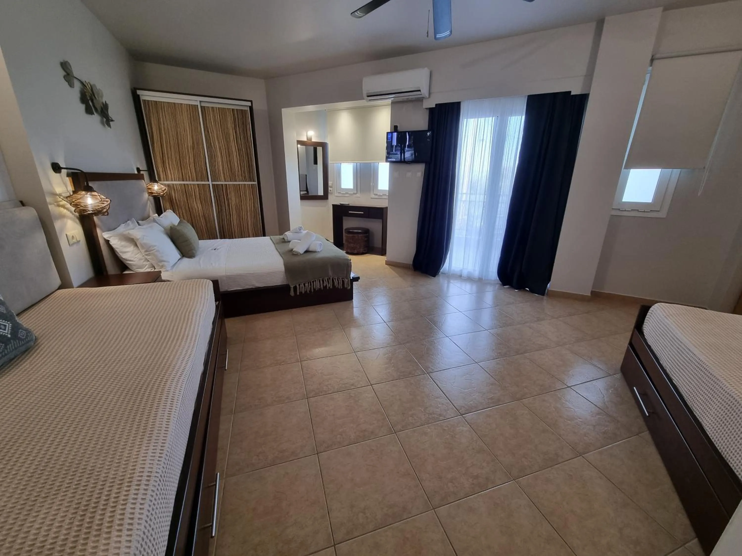 Bed in GreenHill Holiday Suites