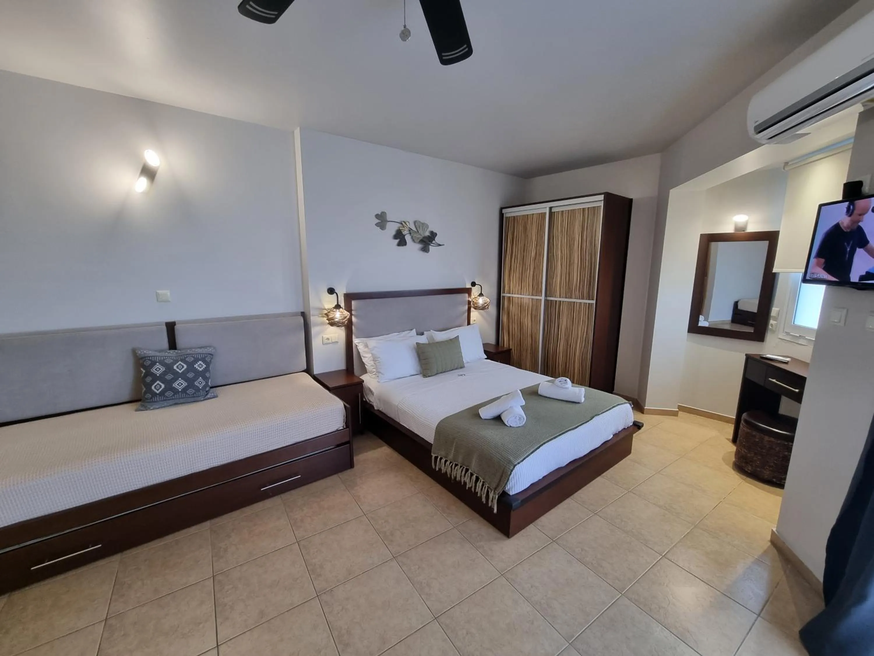 Bed in GreenHill Holiday Suites