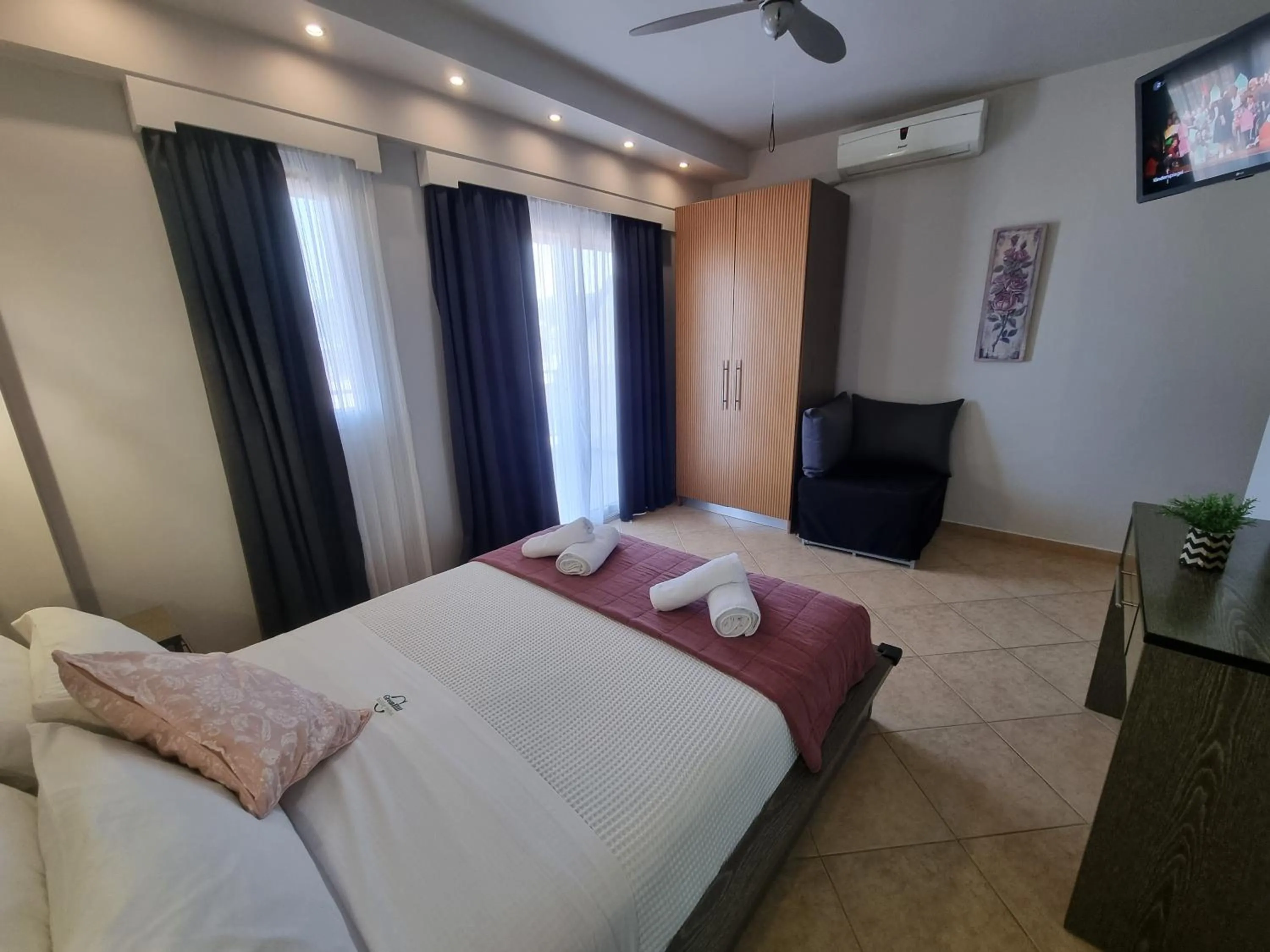 Bed in GreenHill Holiday Suites
