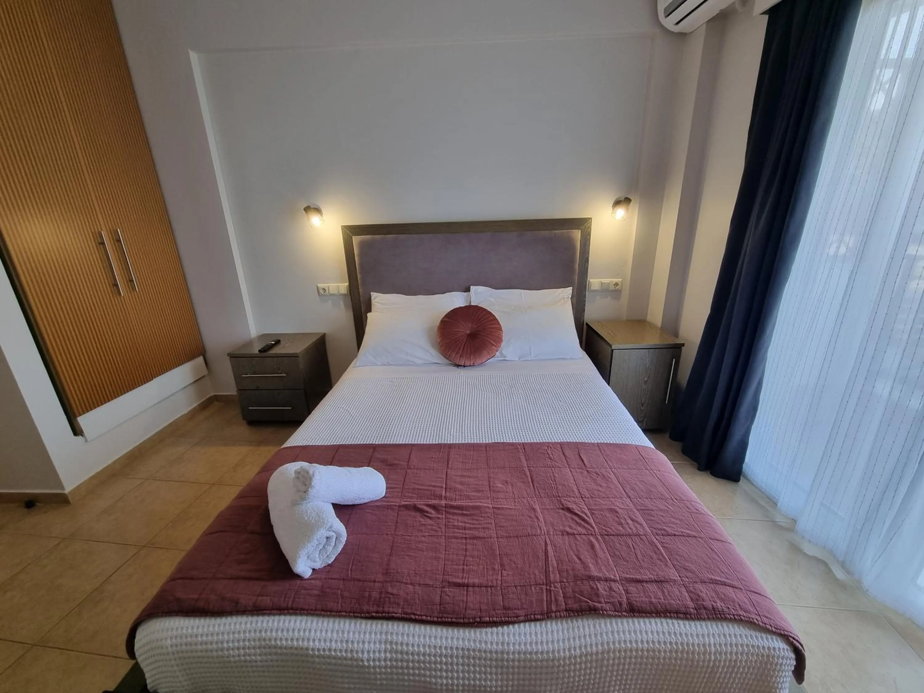 Bed in GreenHill Holiday Suites
