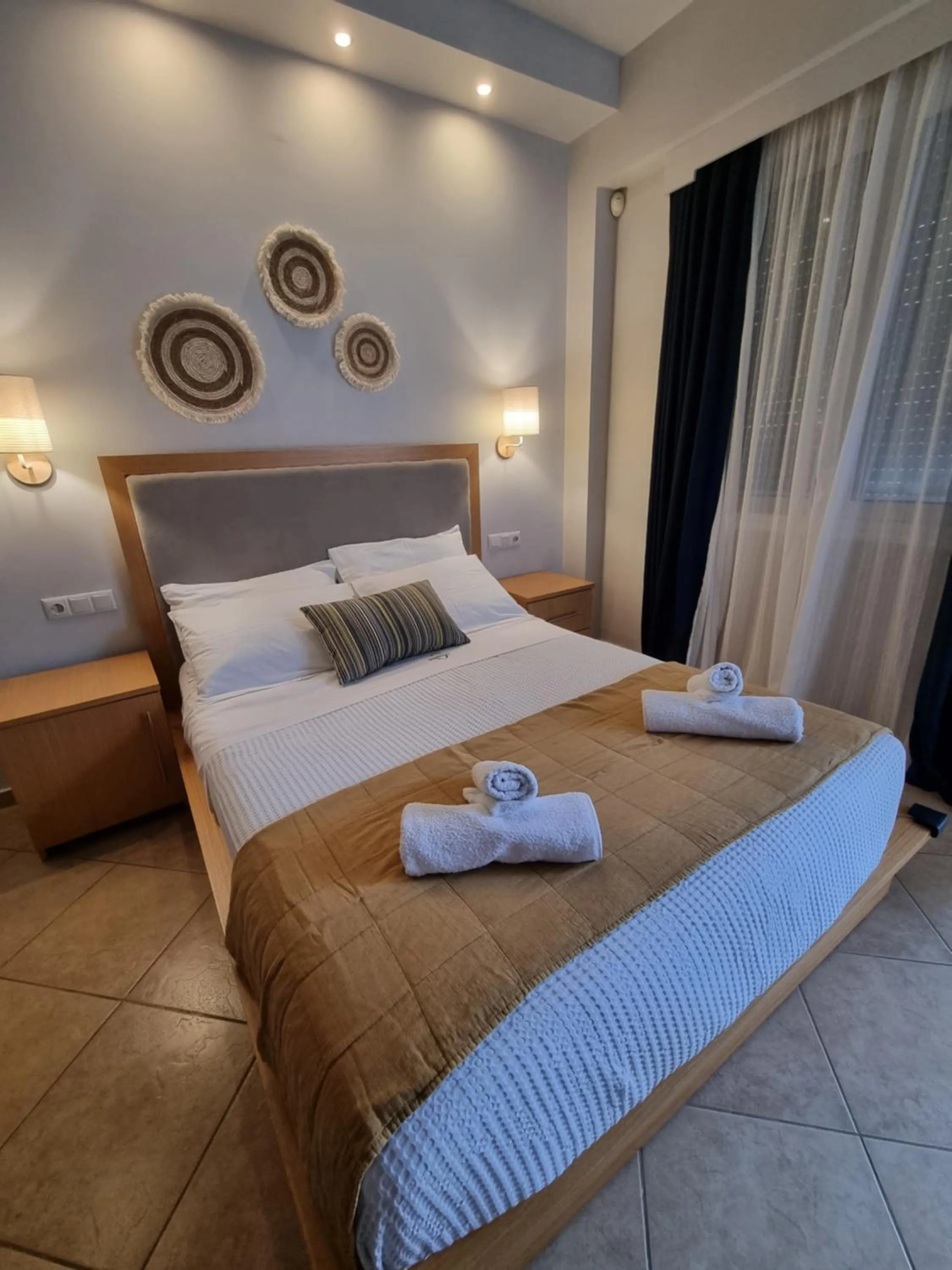 Bed in GreenHill Holiday Suites