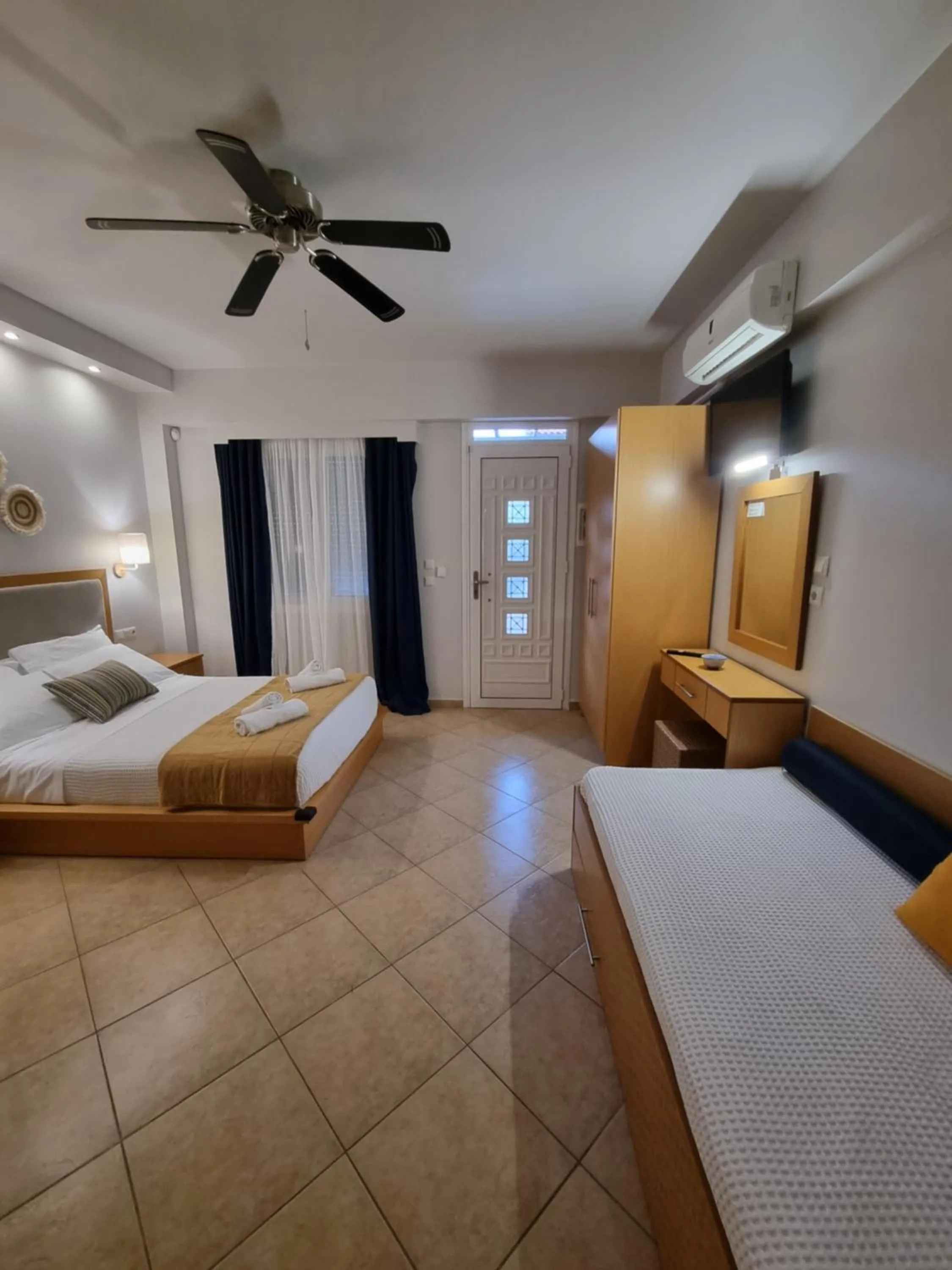 Bed in GreenHill Holiday Suites