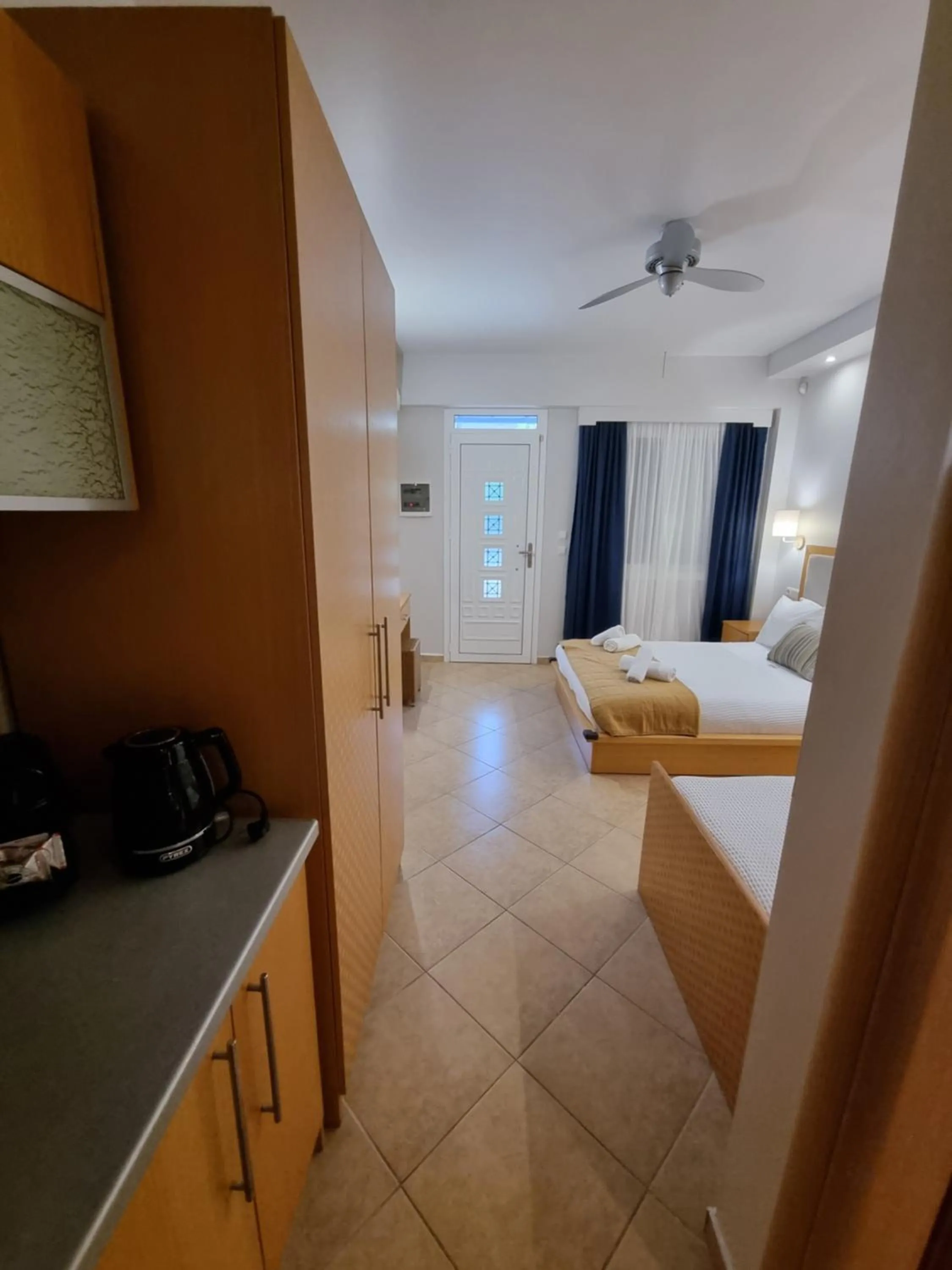 Bed in GreenHill Holiday Suites