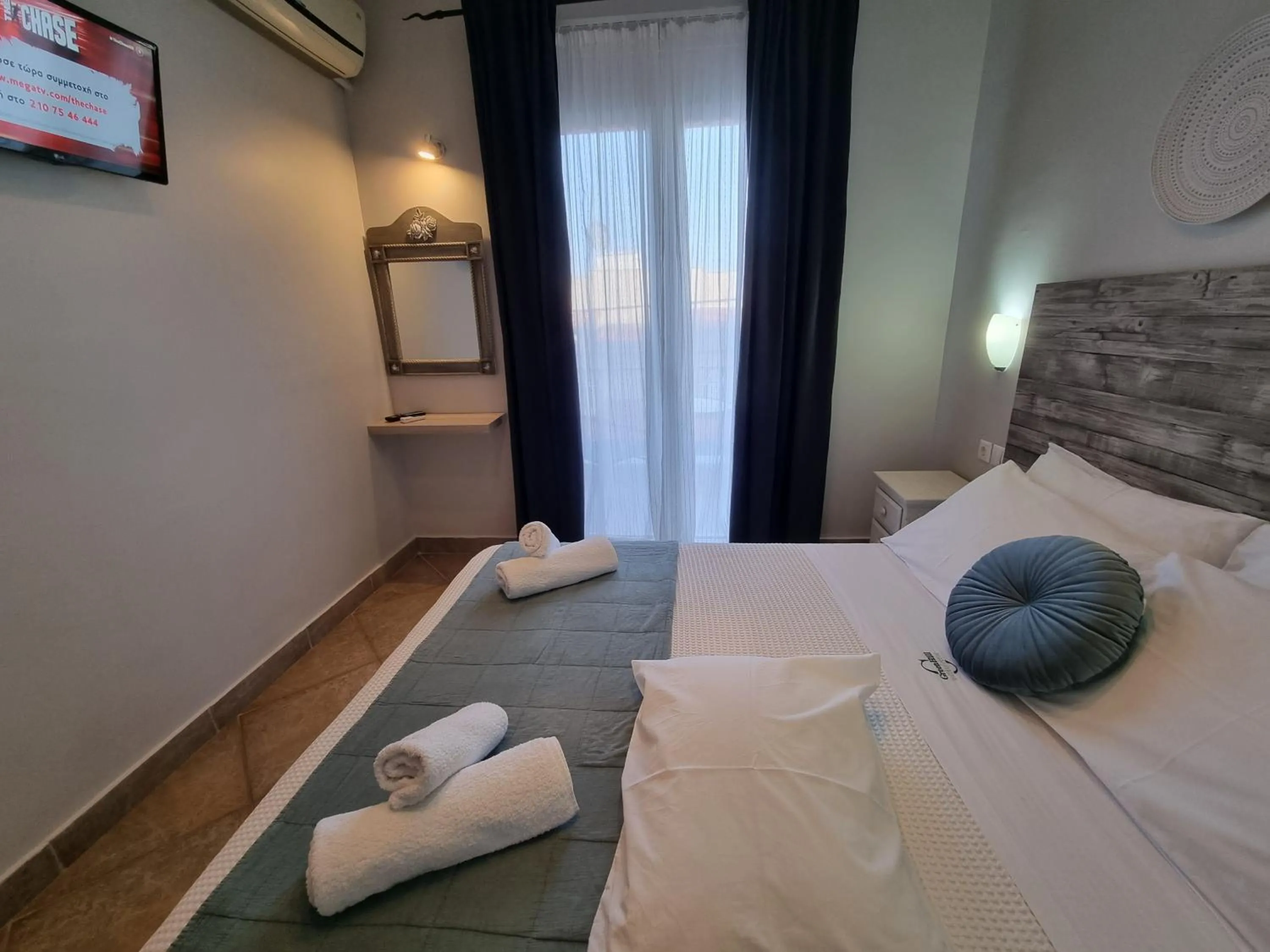 Bed in GreenHill Holiday Suites