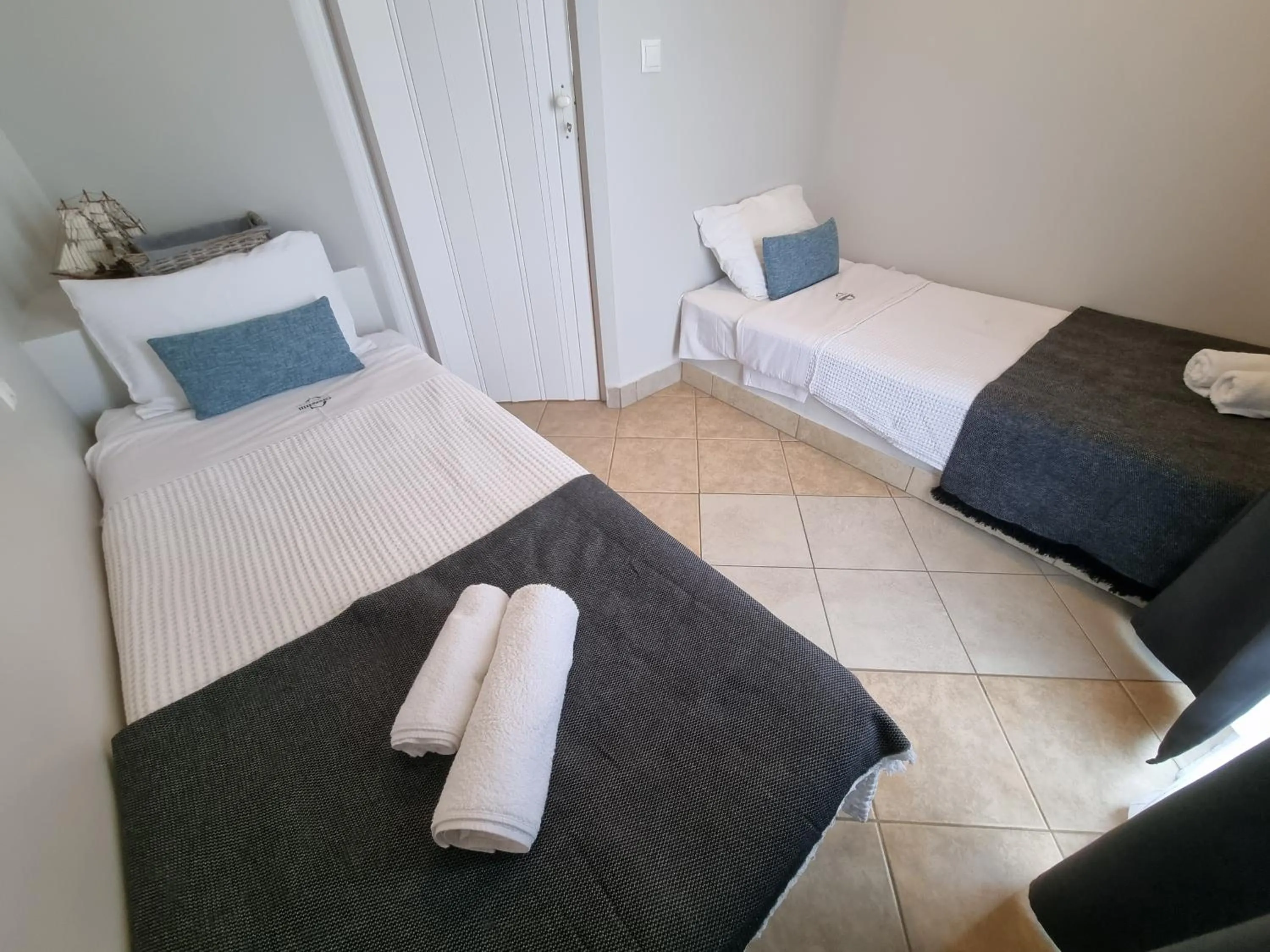Bed in GreenHill Holiday Suites