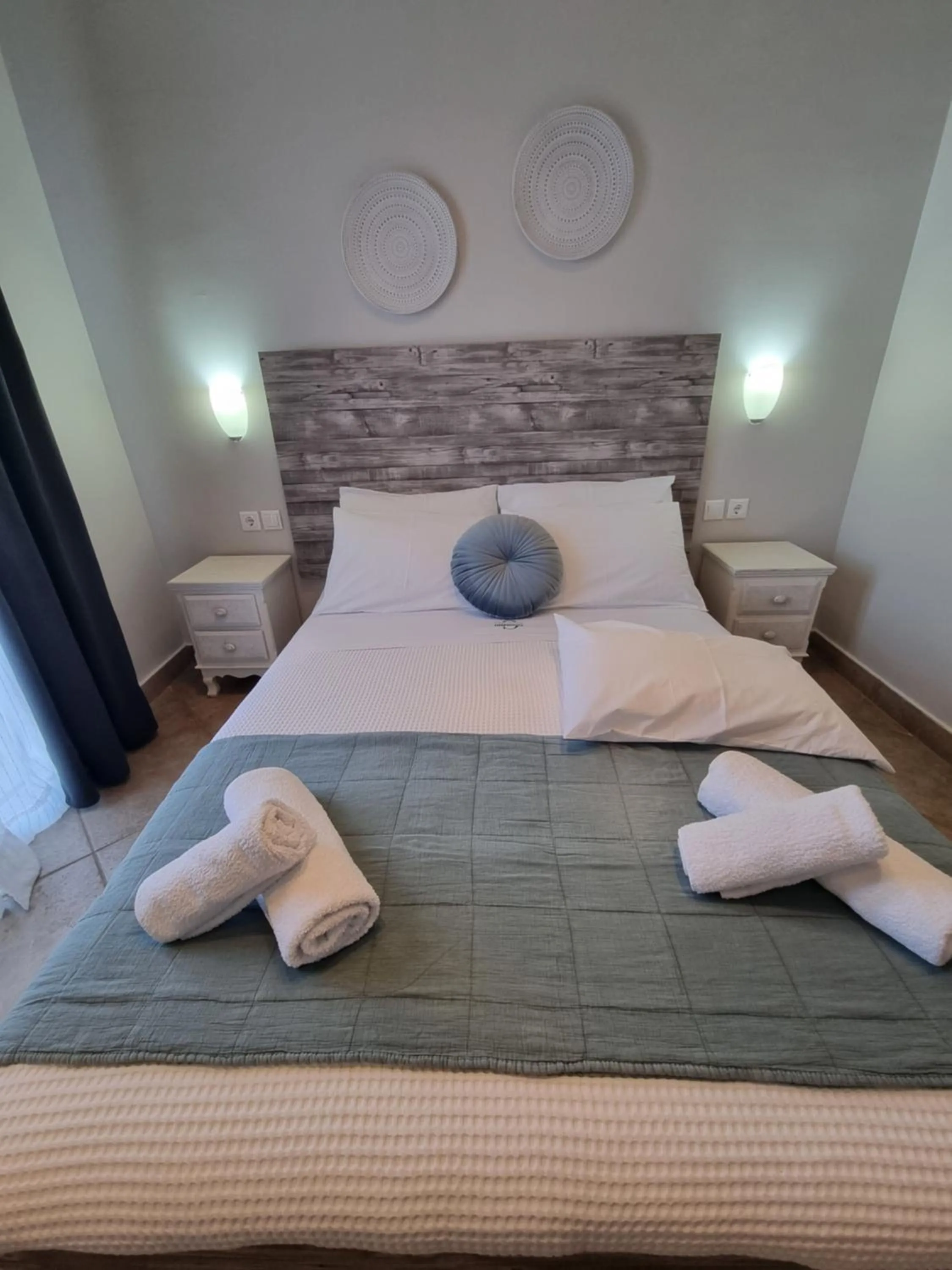 Bed in GreenHill Holiday Suites