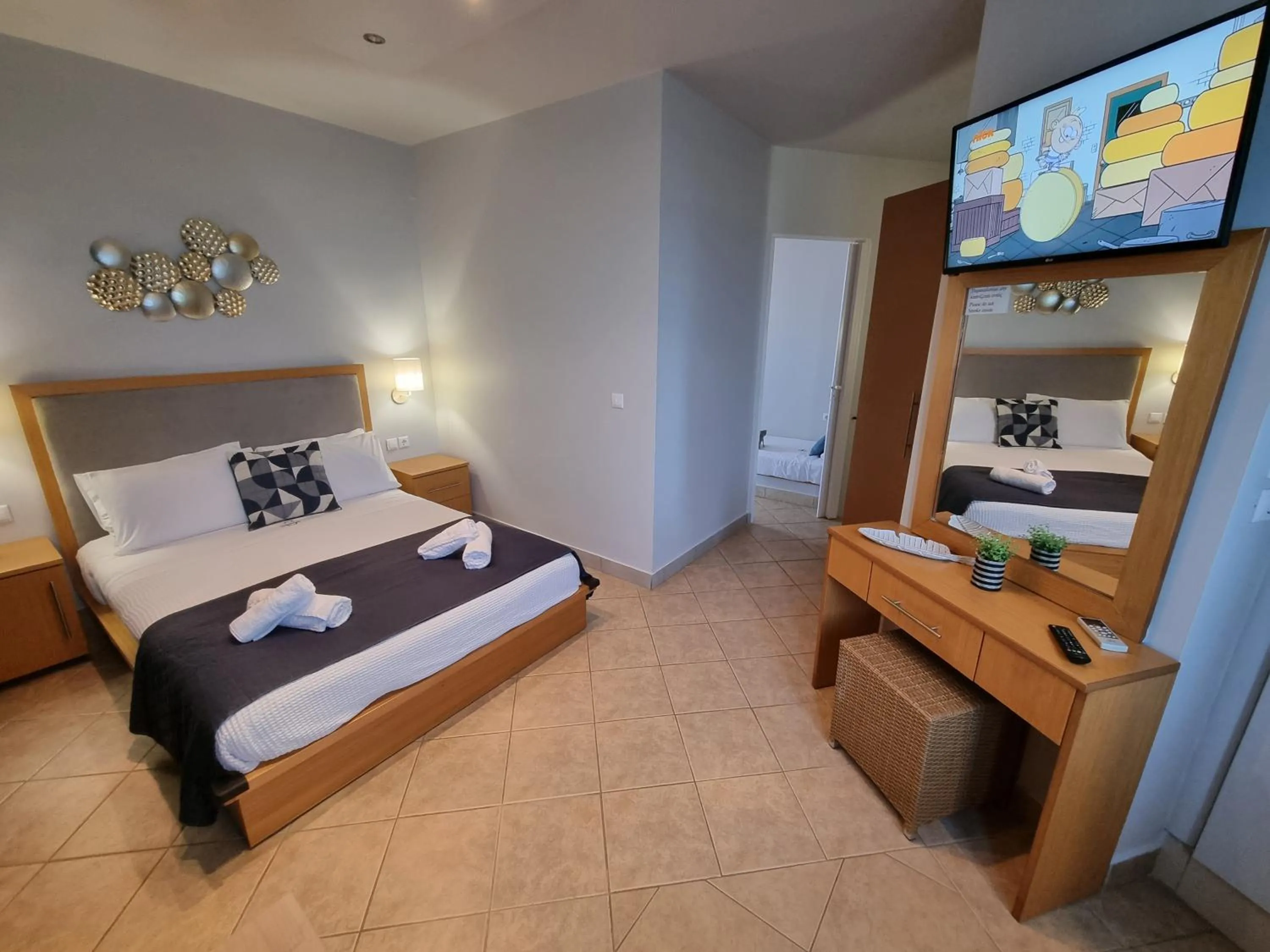 Bed in GreenHill Holiday Suites
