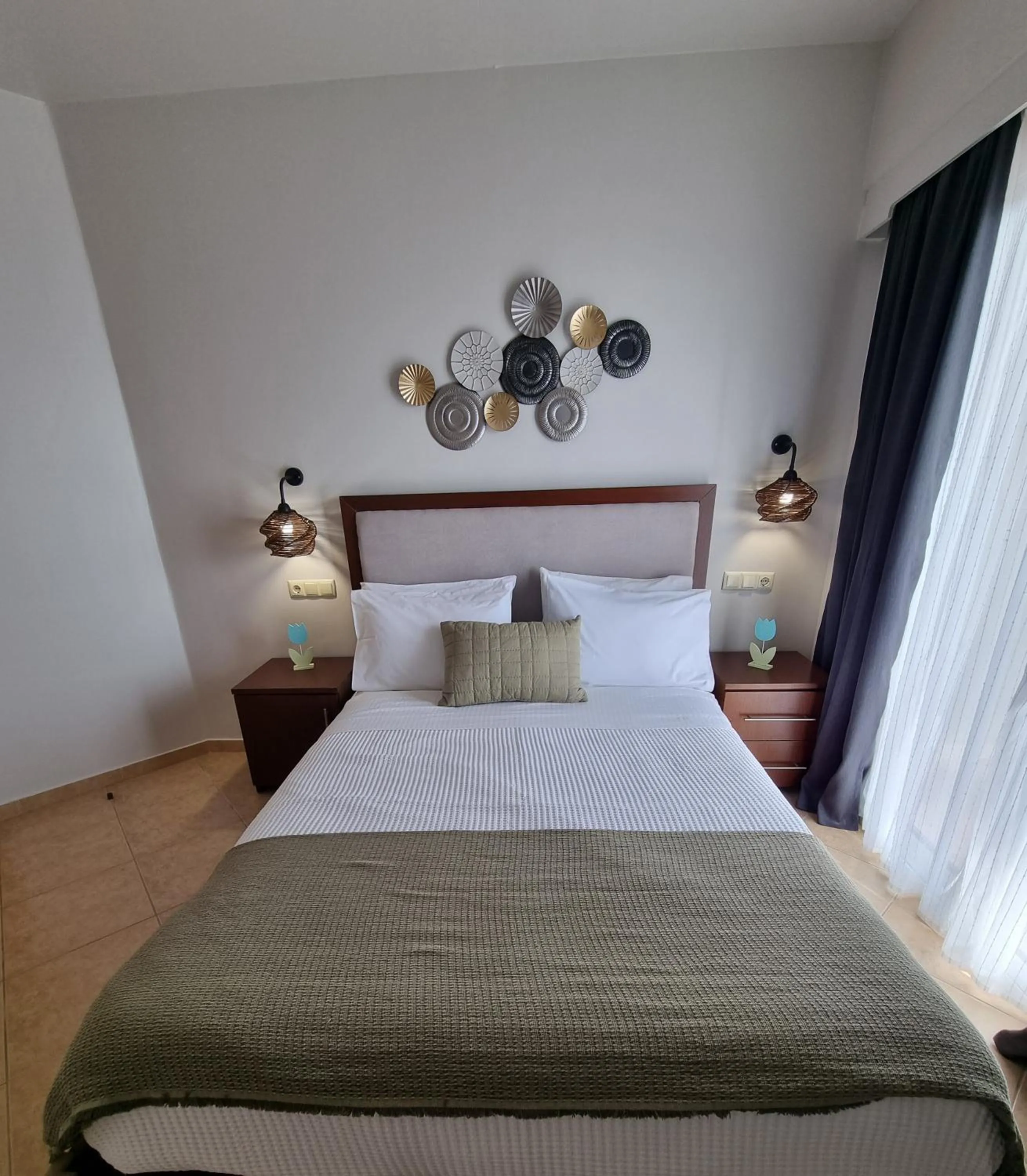 Bed in GreenHill Holiday Suites