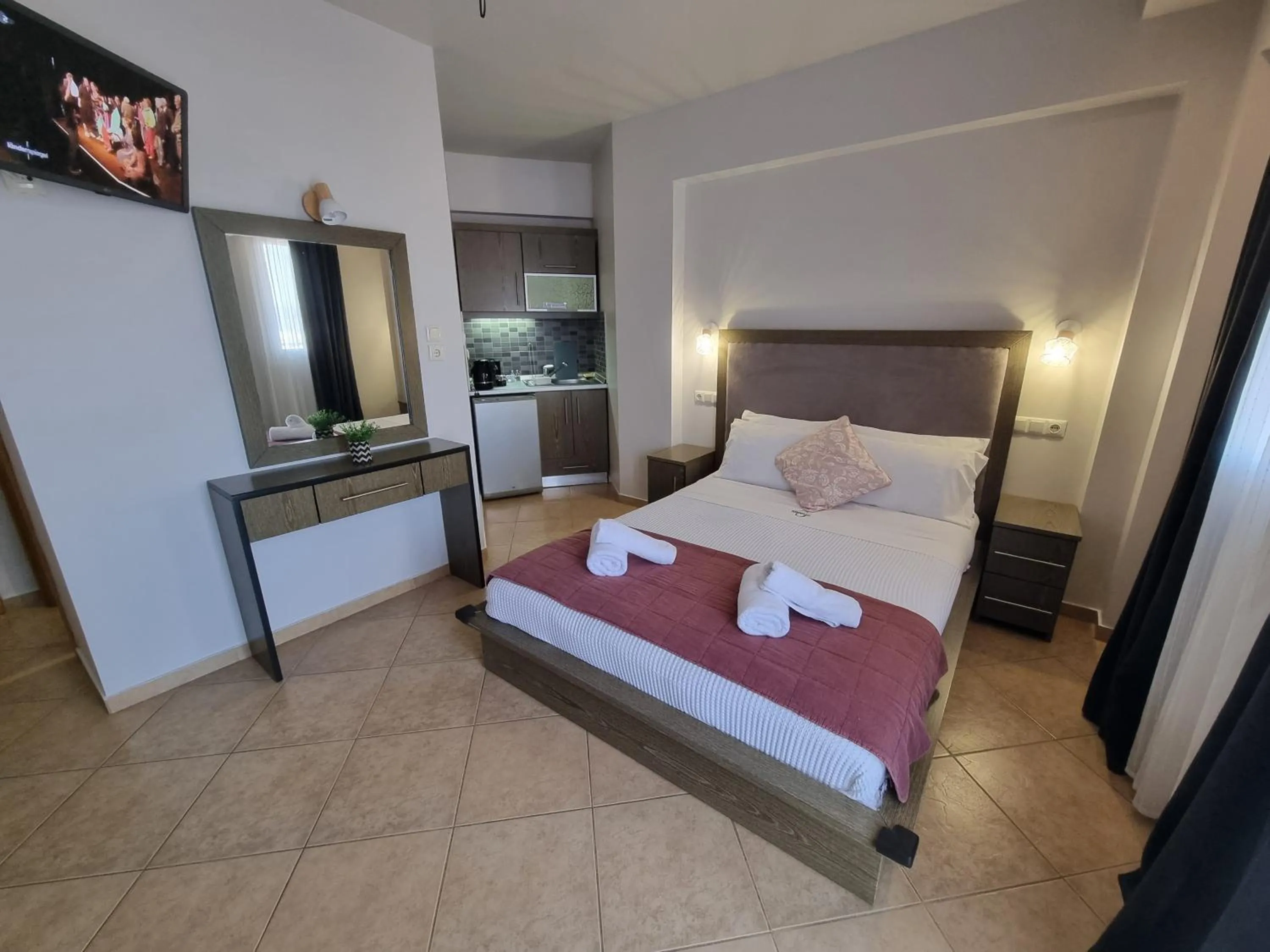 Bed in GreenHill Holiday Suites