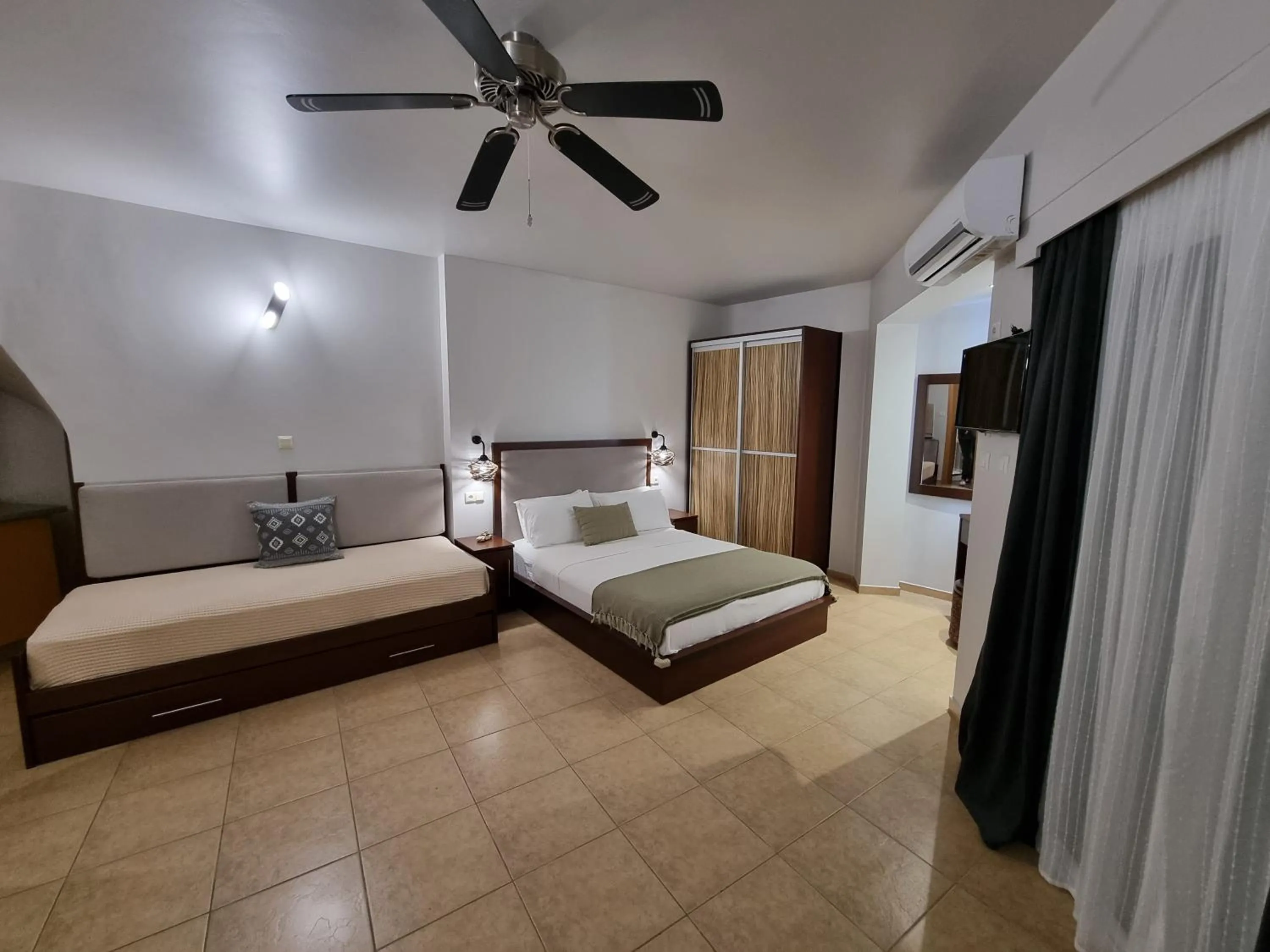 Bed in GreenHill Holiday Suites