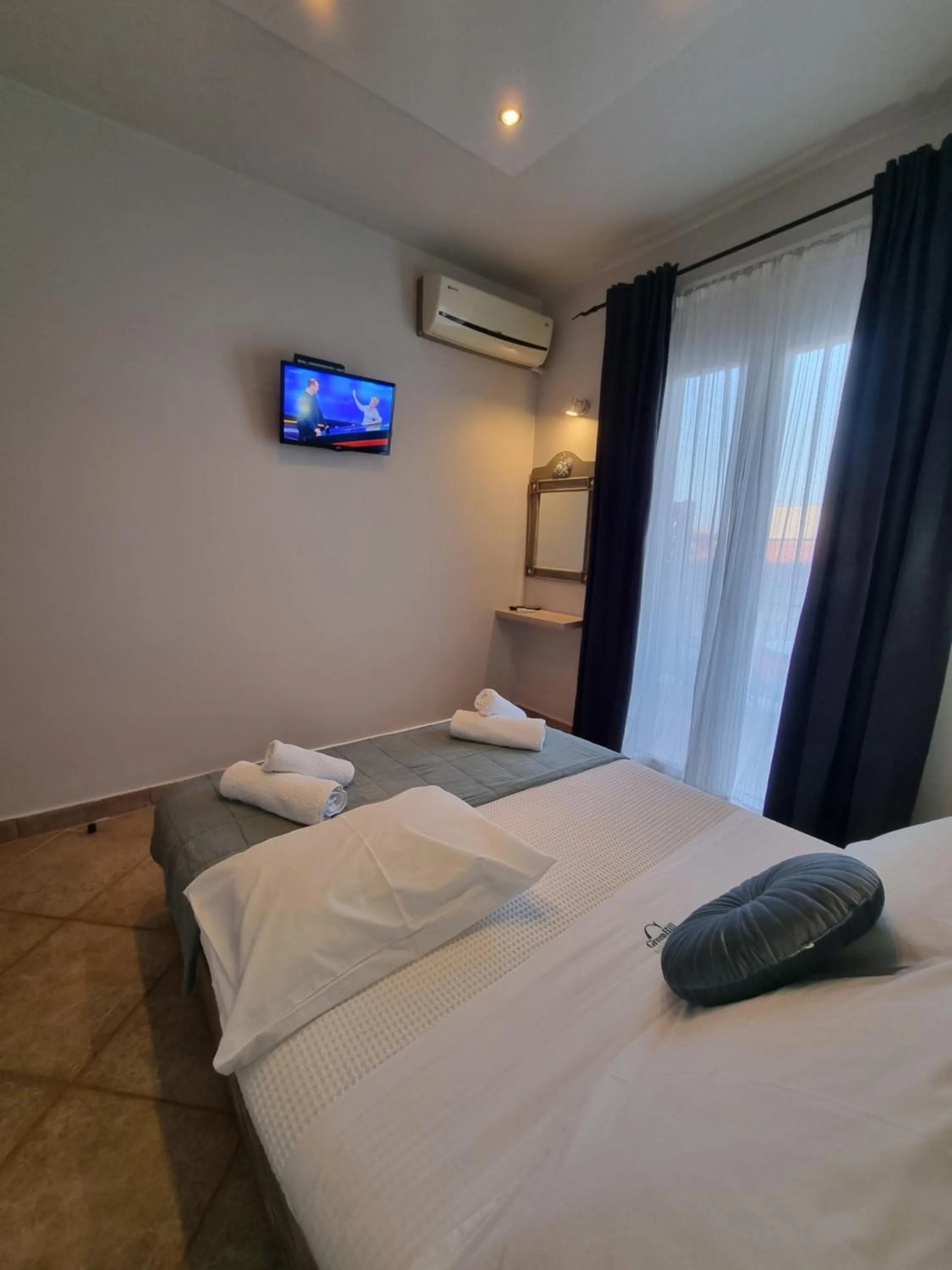 Bed in GreenHill Holiday Suites