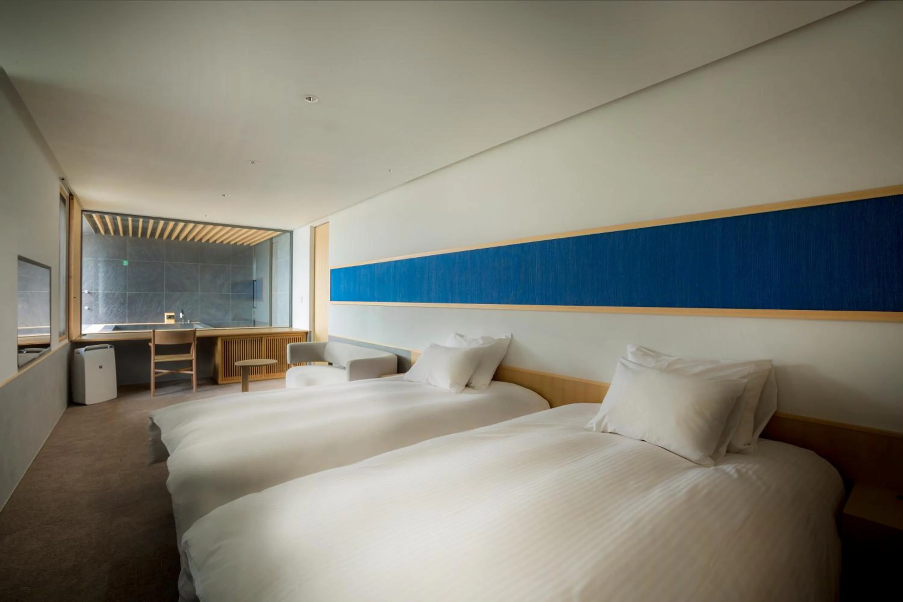 Bed in Hotel Kitanoya