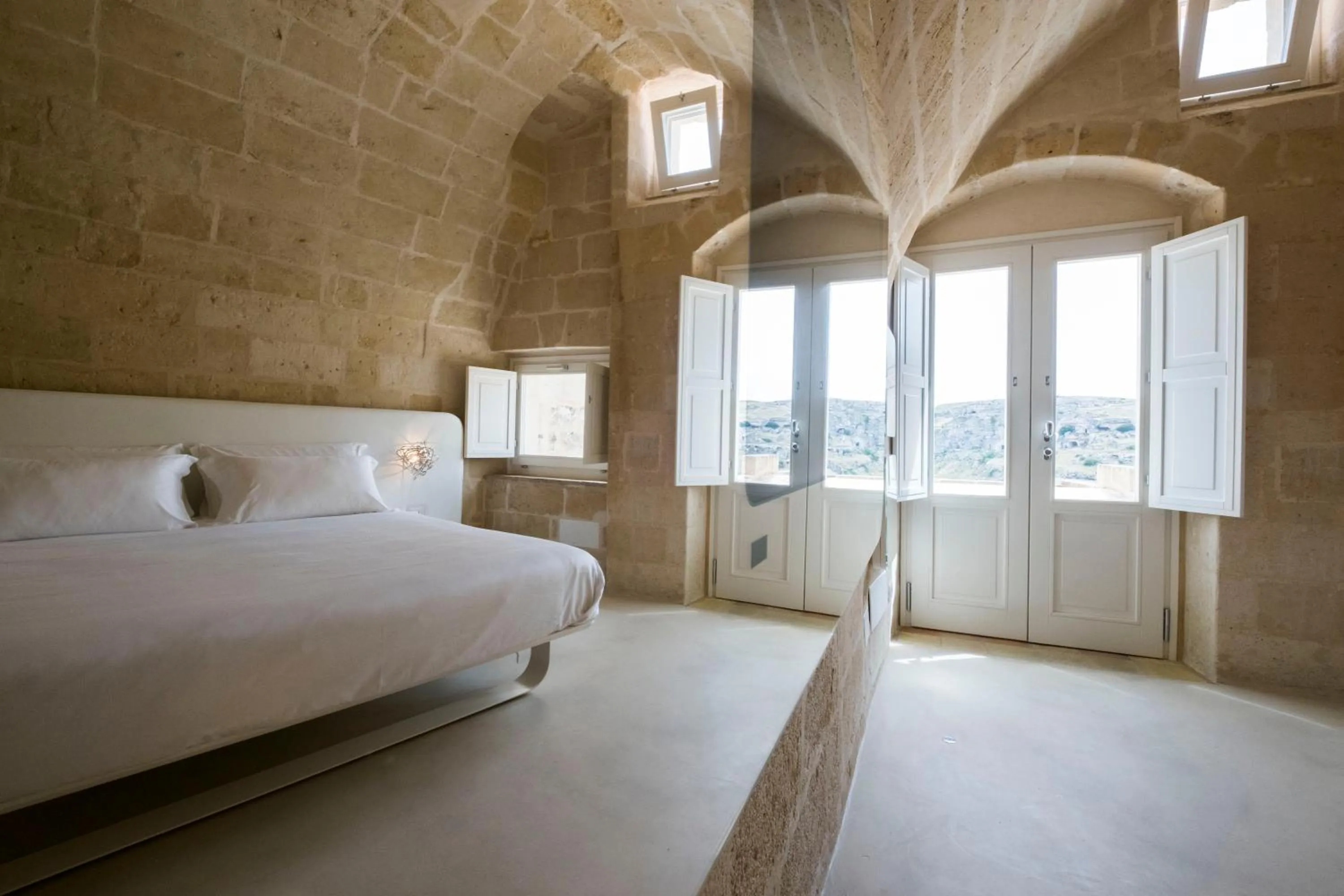 Bed in Aquatio Cave Luxury Hotel & SPA