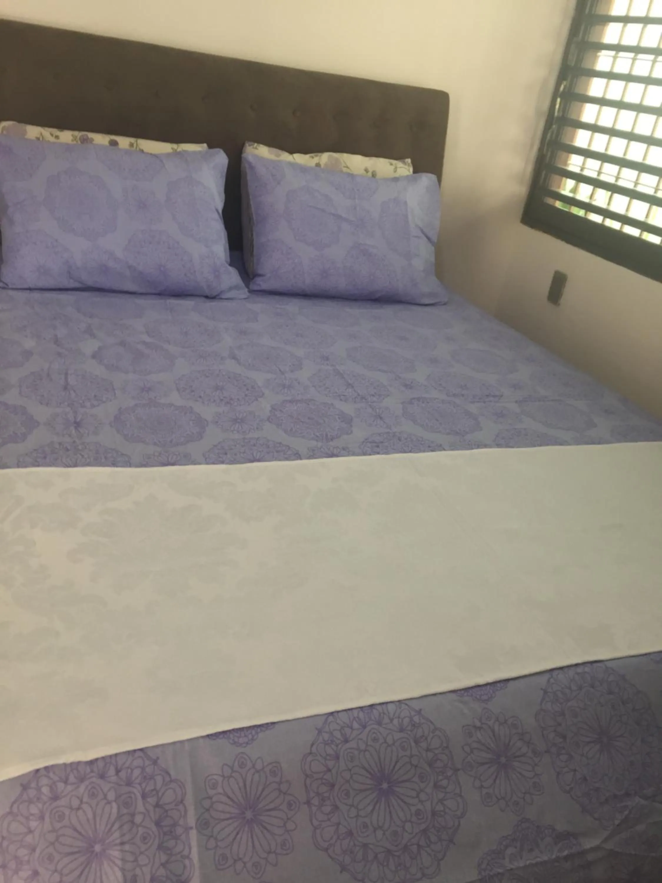 Bed in O Portuga Pousada