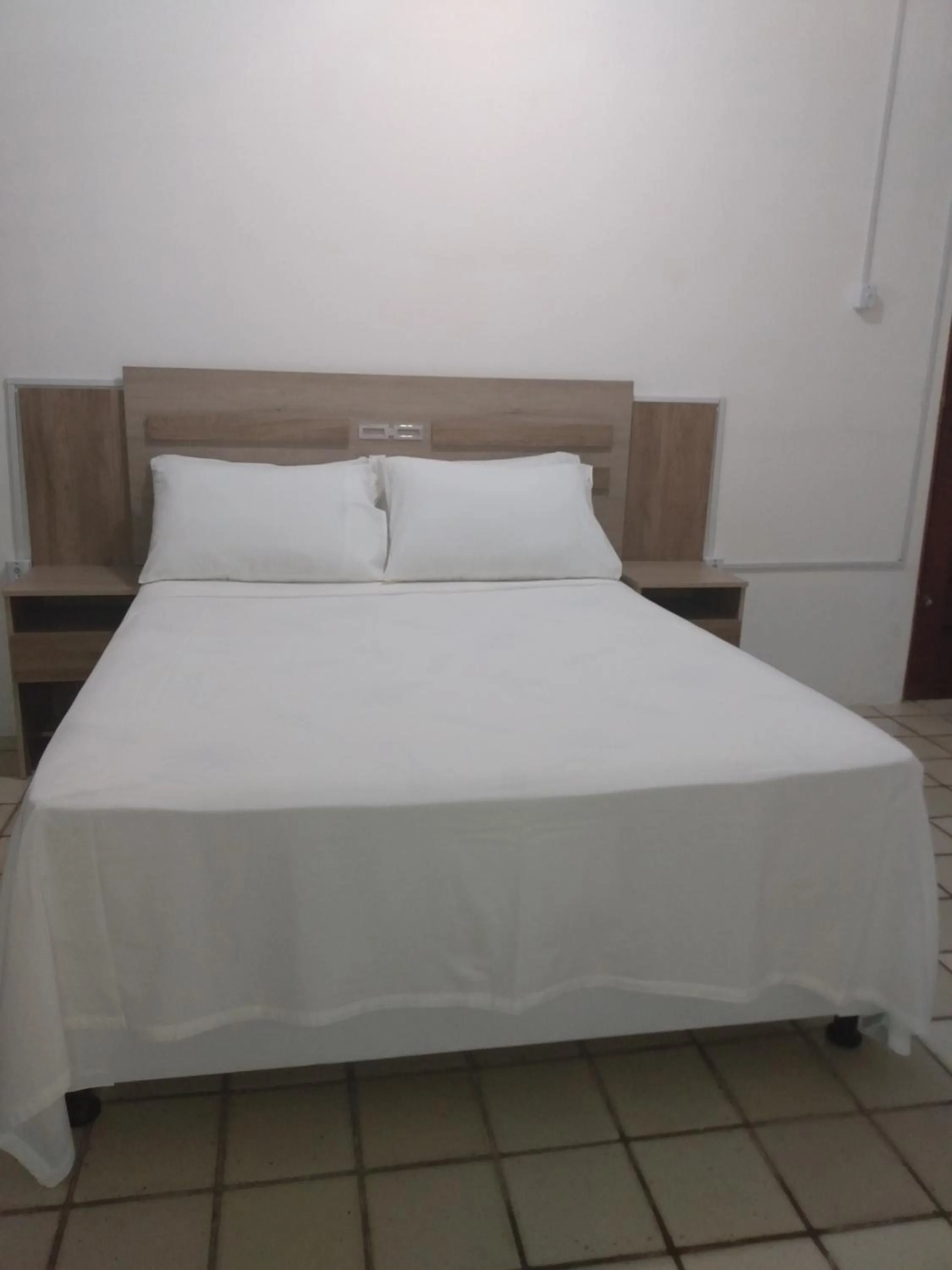 Bed in O Portuga Pousada