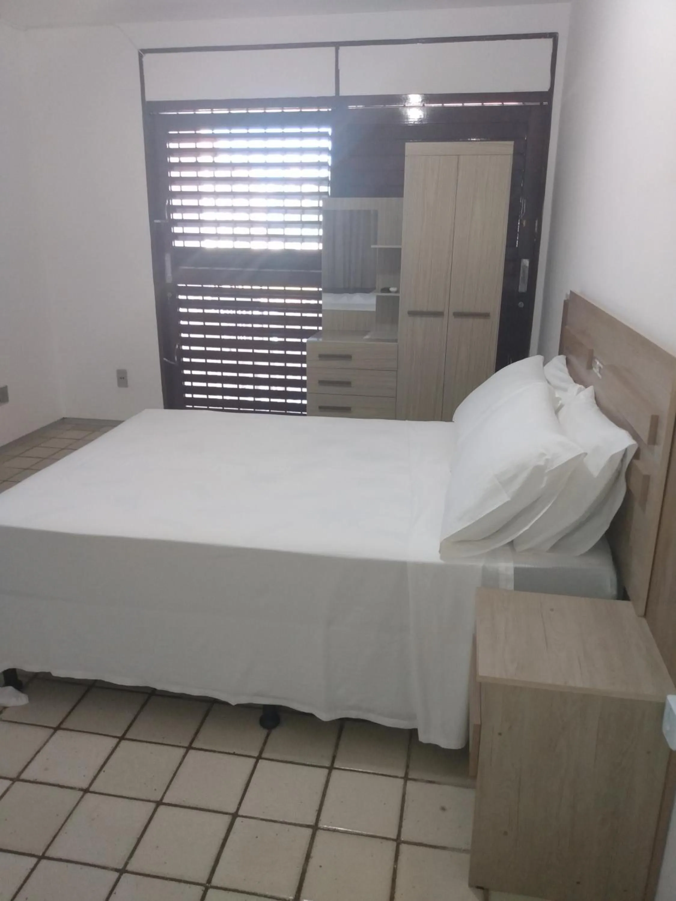 Bed in O Portuga Pousada