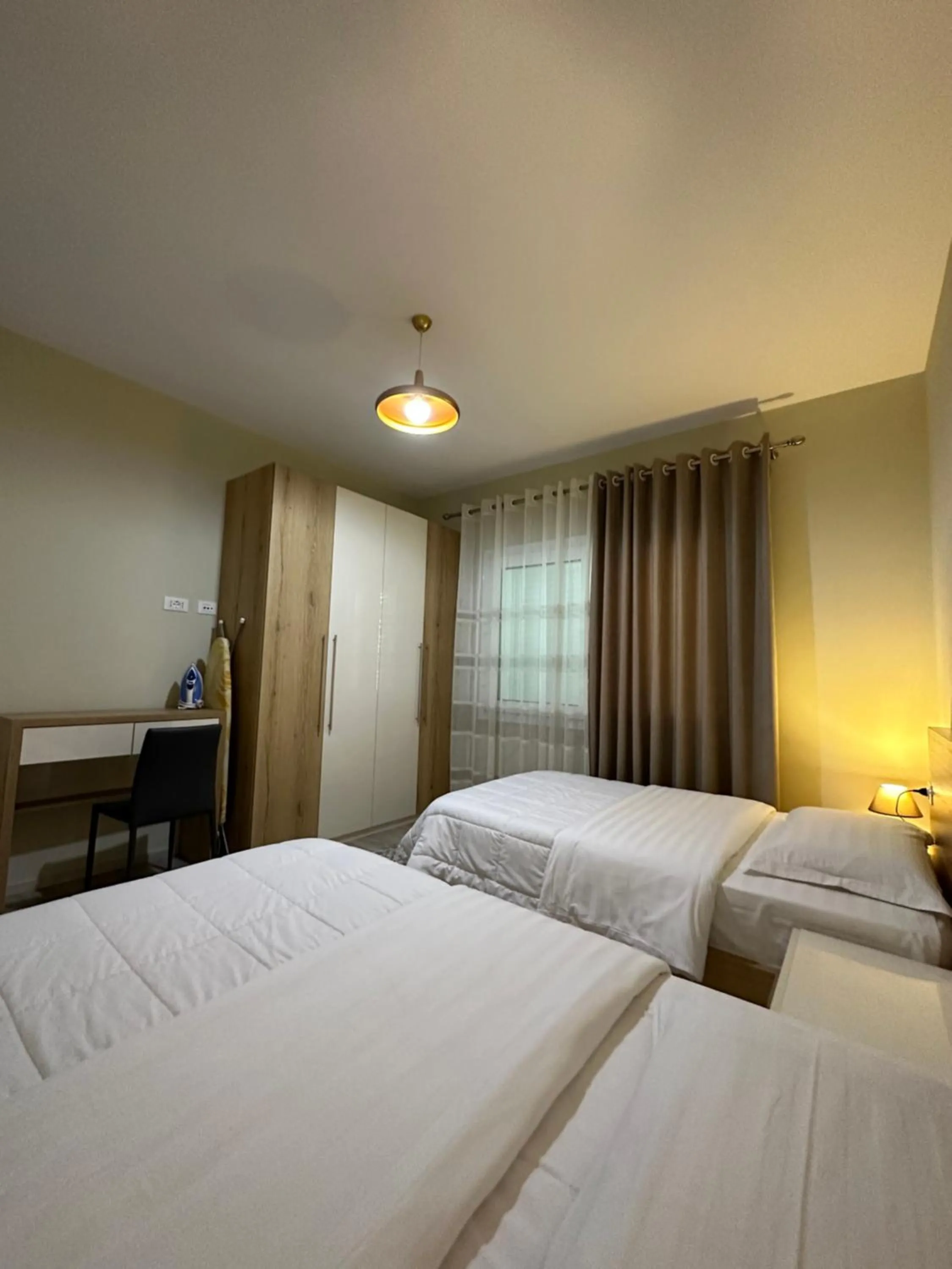 Bed in Brilant Apartament