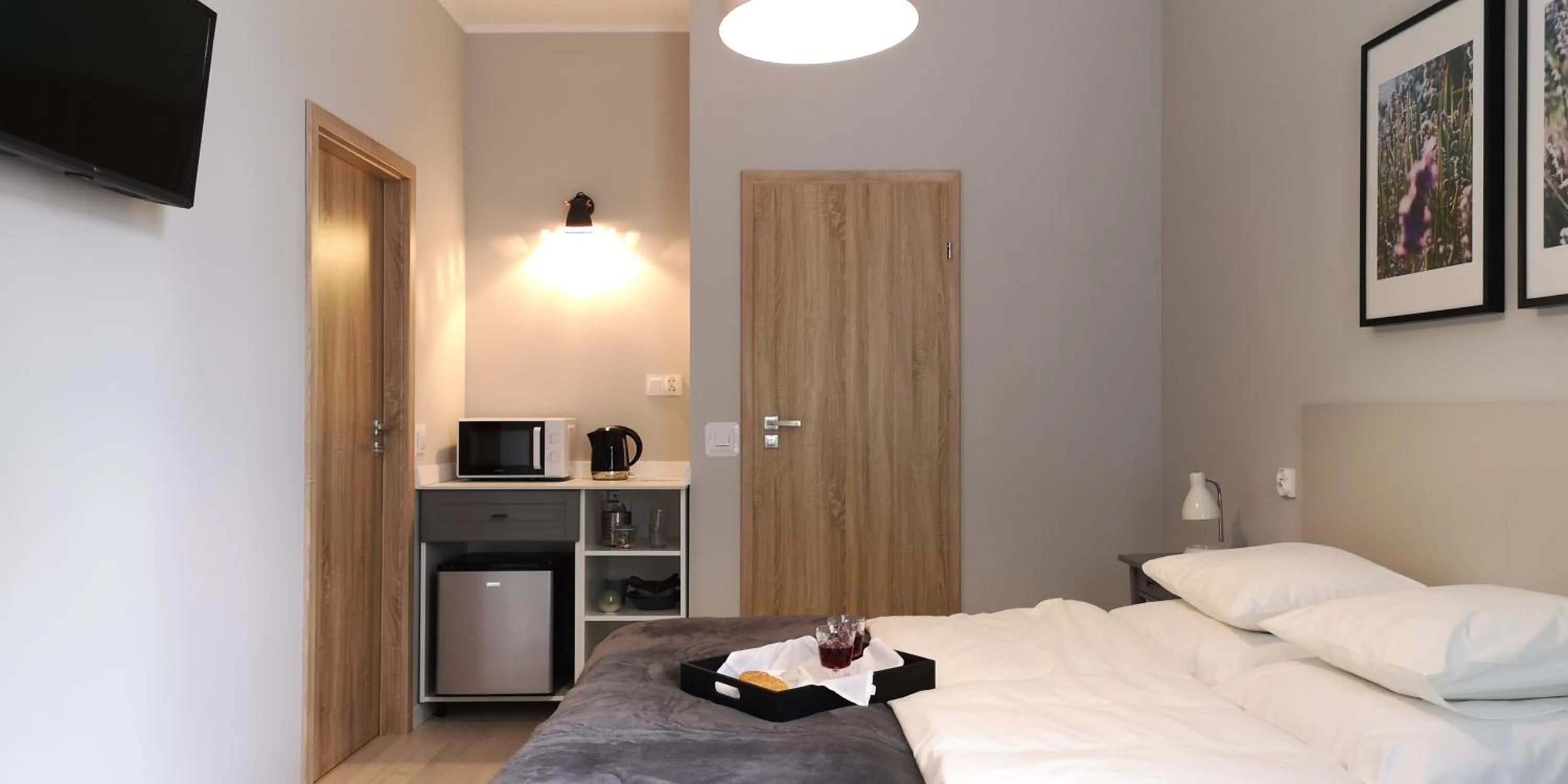 Bed in Glam House Apartments