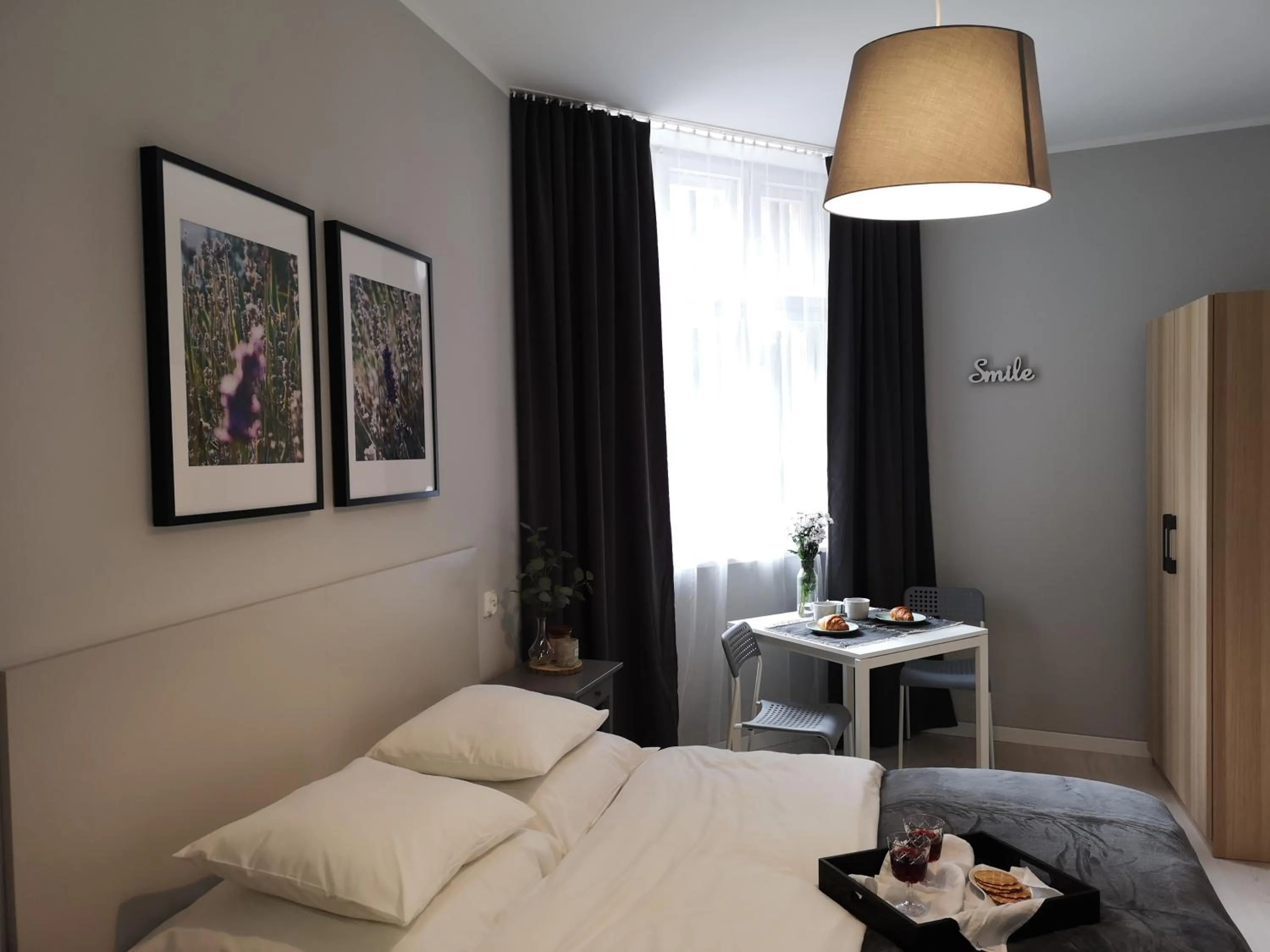 Bed in Glam House Apartments