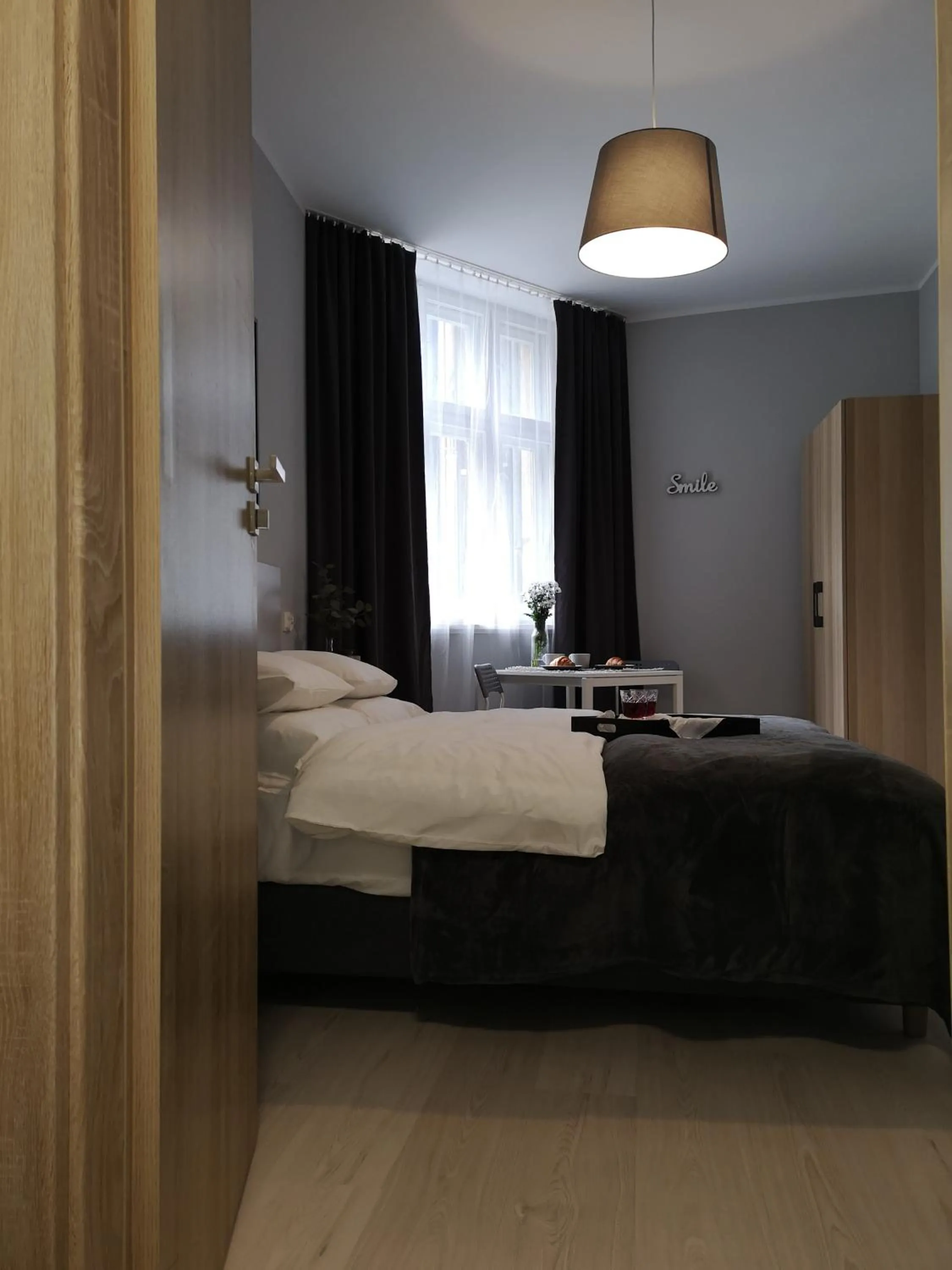 Bed in Glam House Apartments