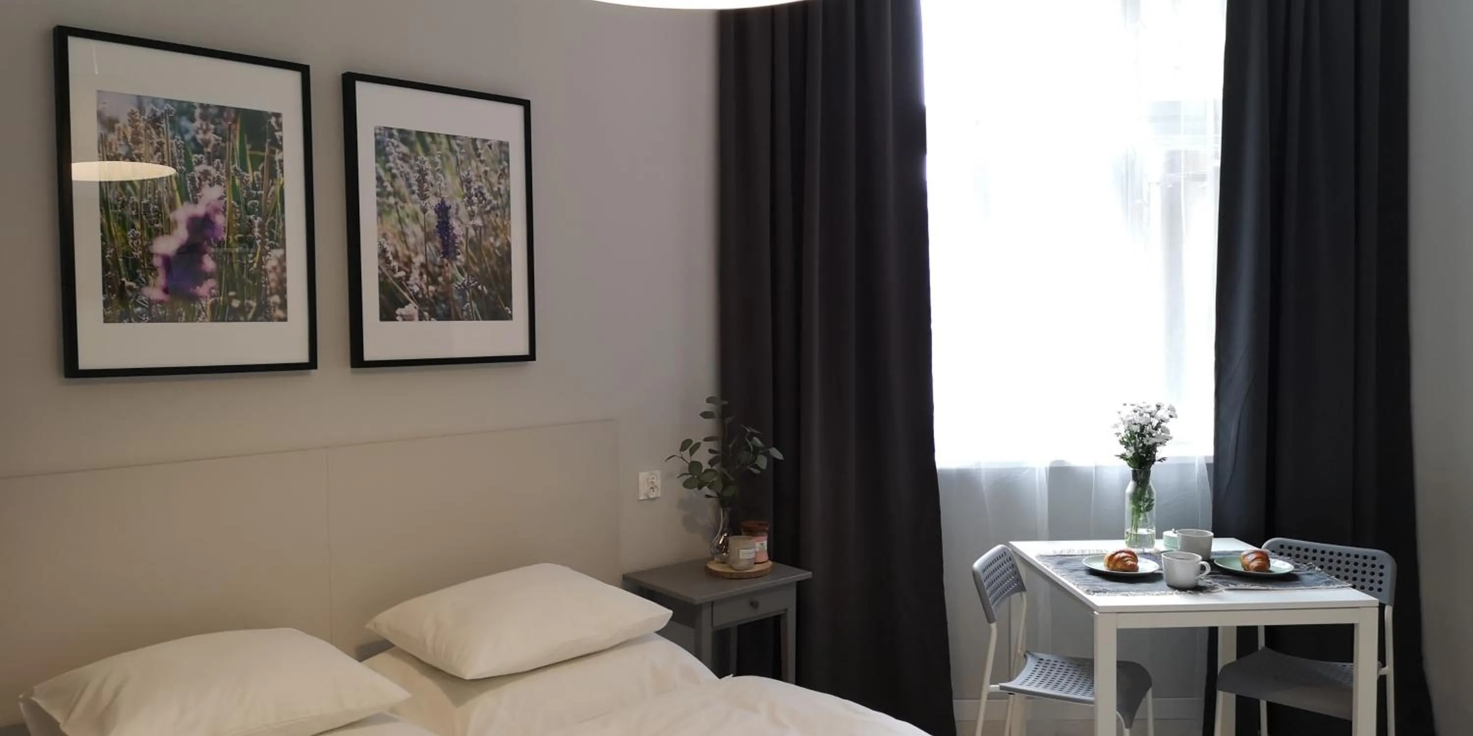 Bed in Glam House Apartments