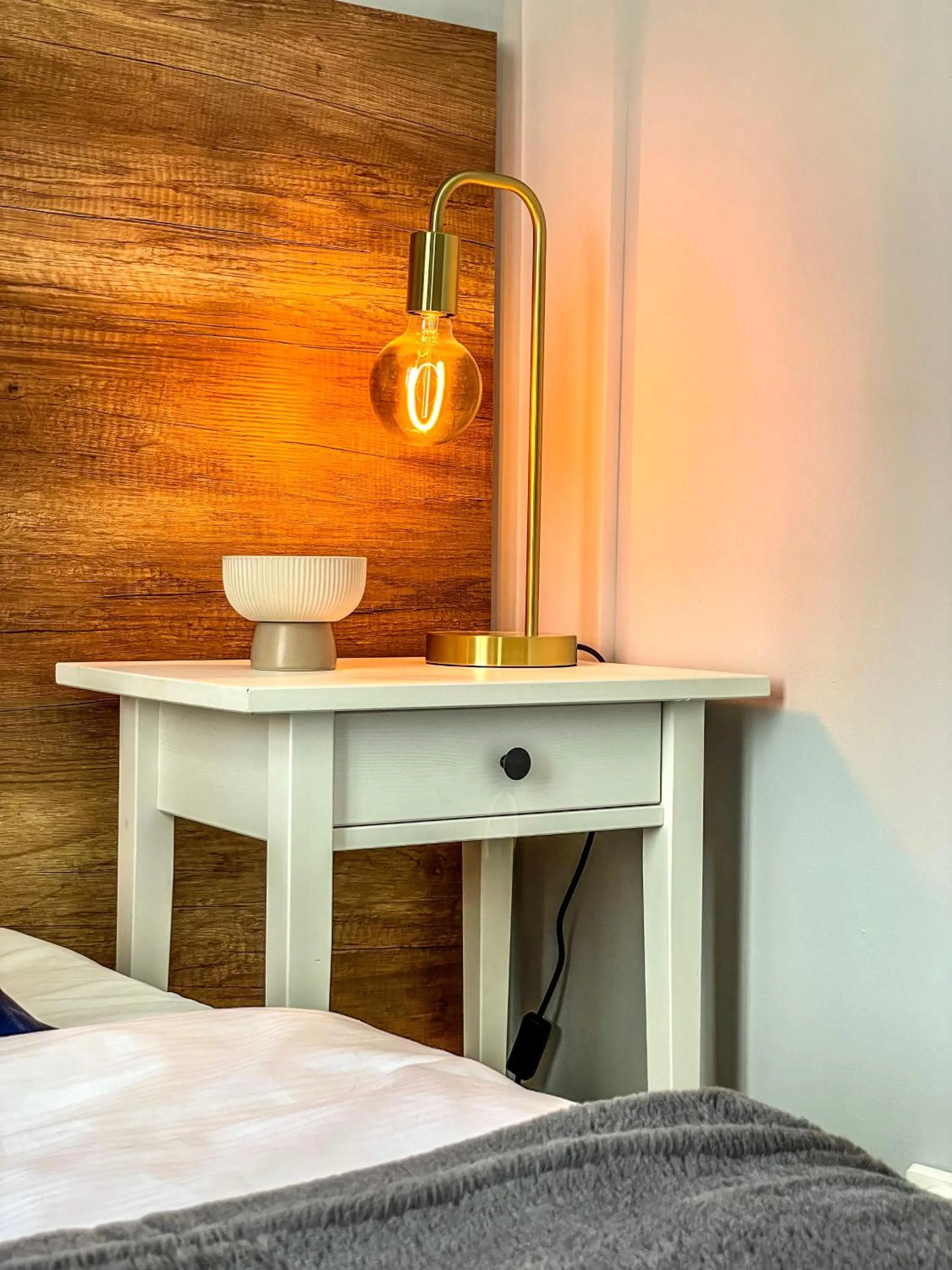 Bed in Glam House Apartments