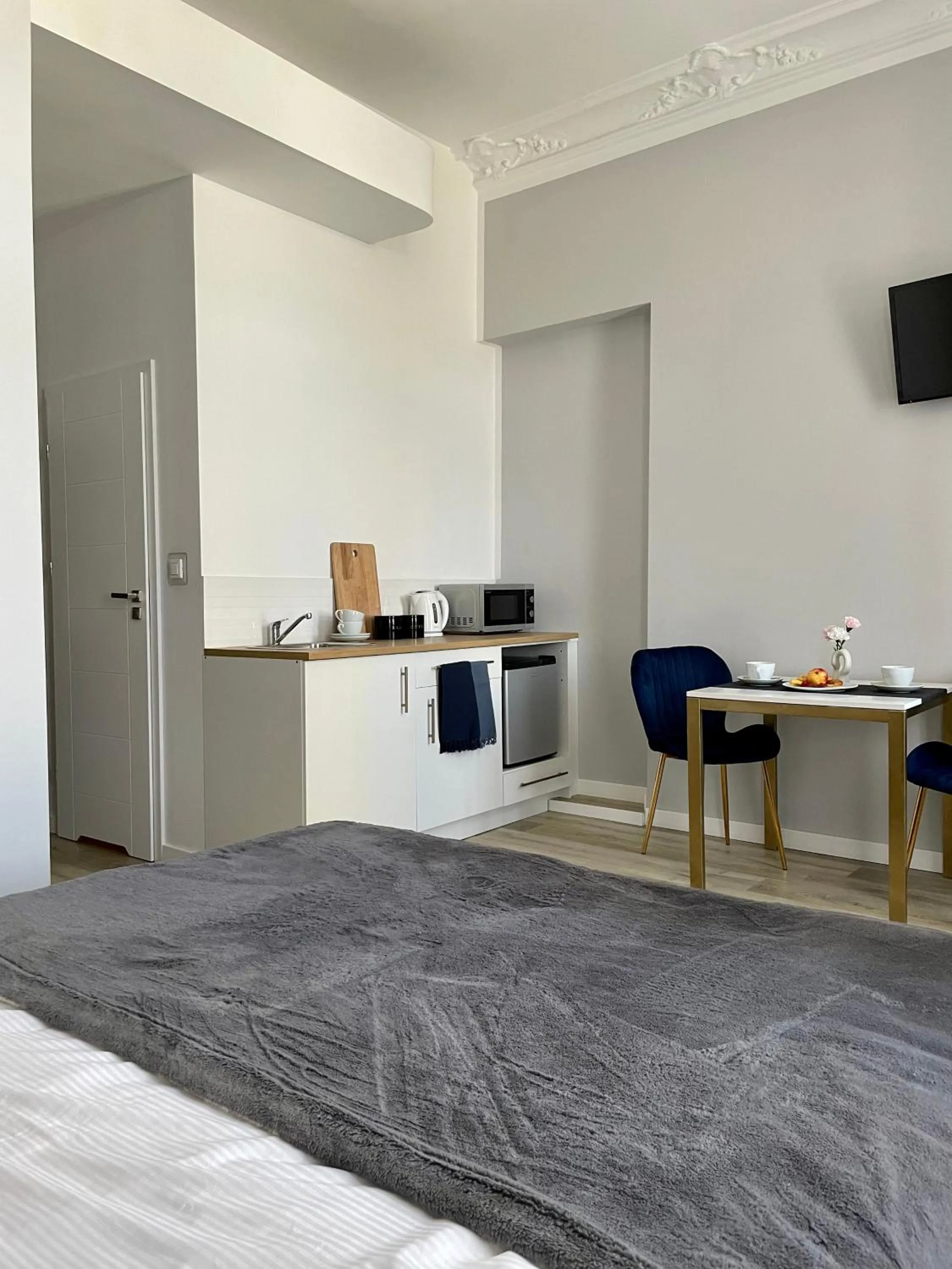 Bed in Glam House Apartments