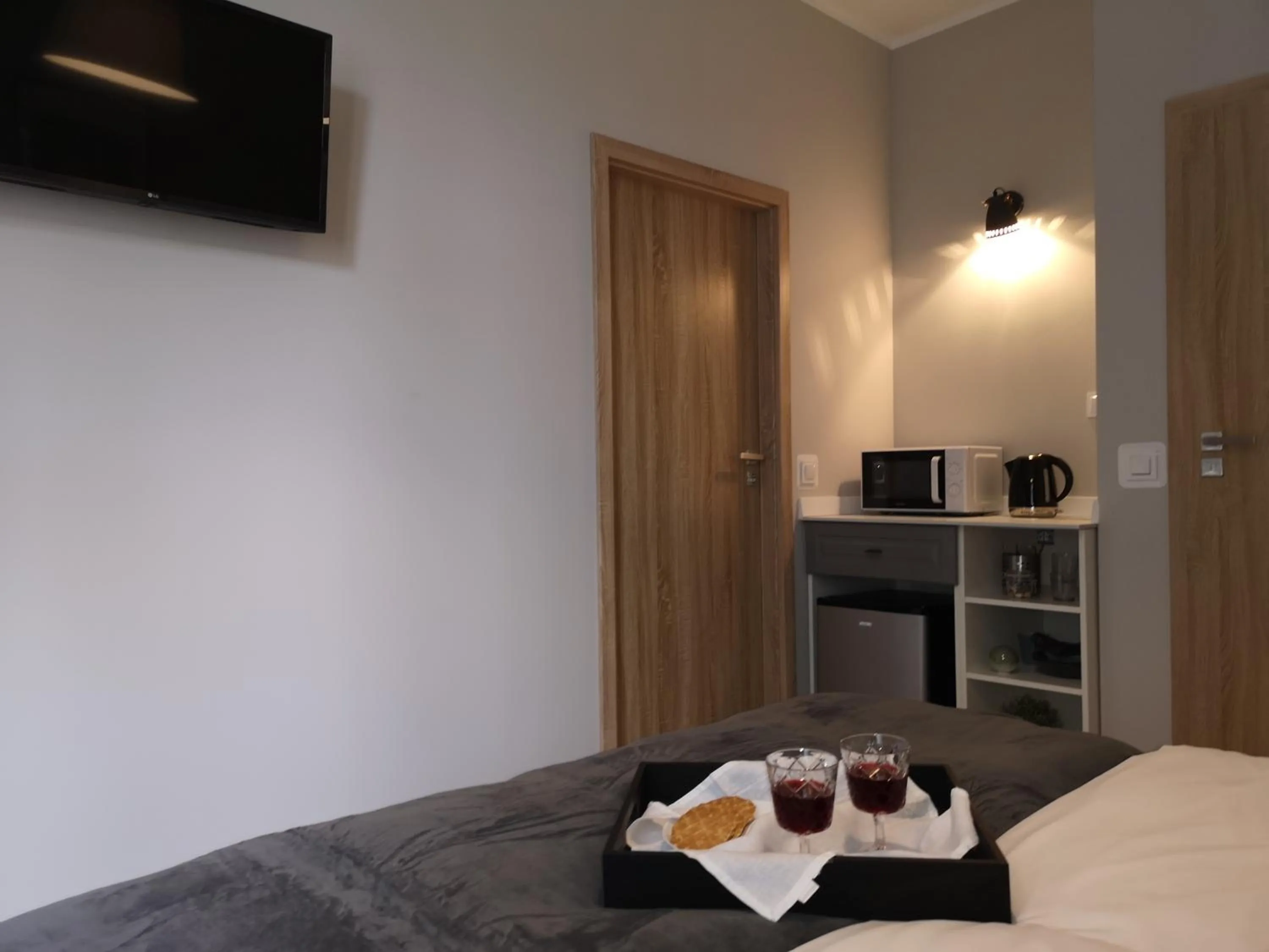 Bed in Glam House Apartments