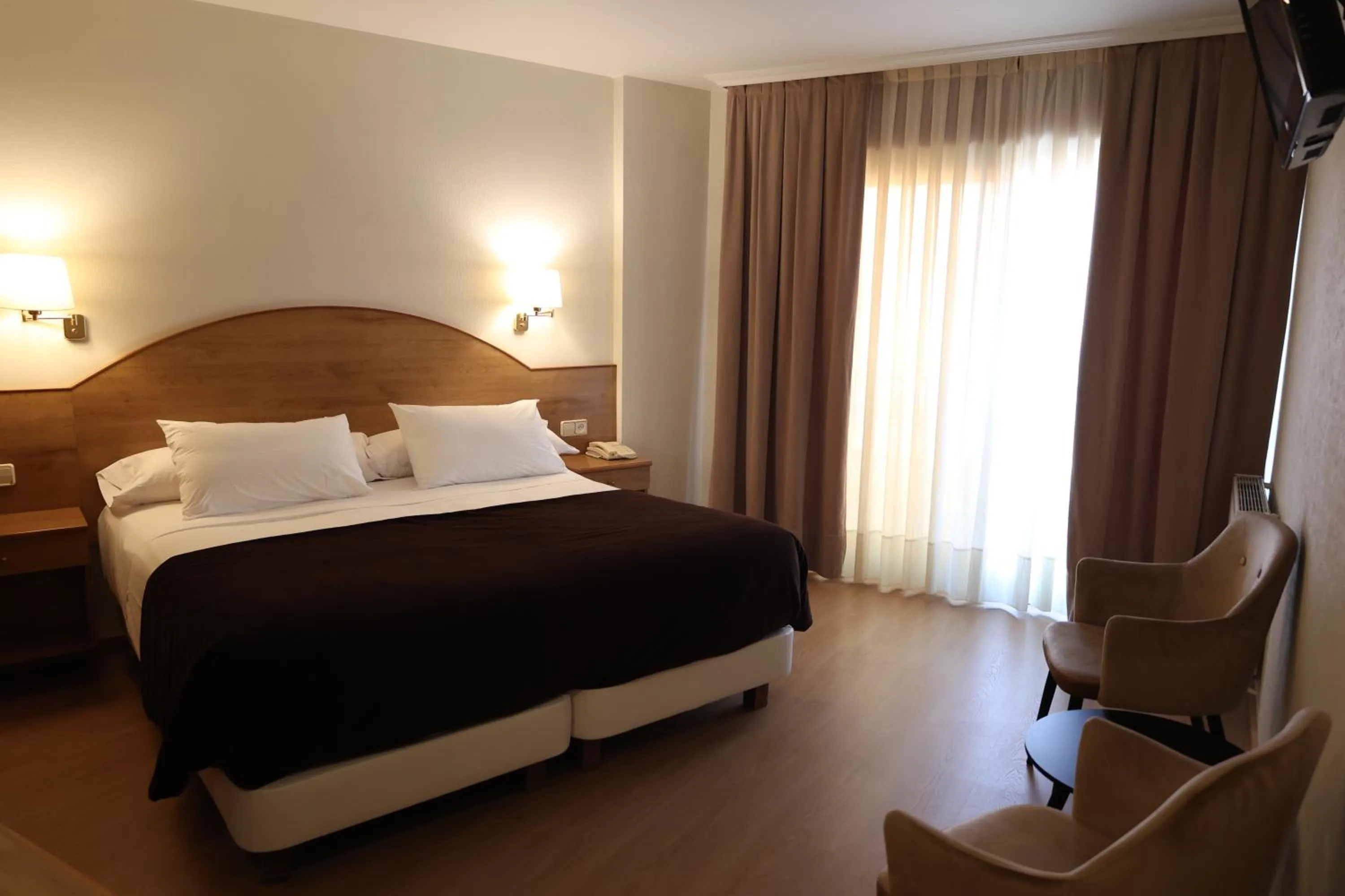 Bedroom, Bed in Hotel Maruxia *** Superior