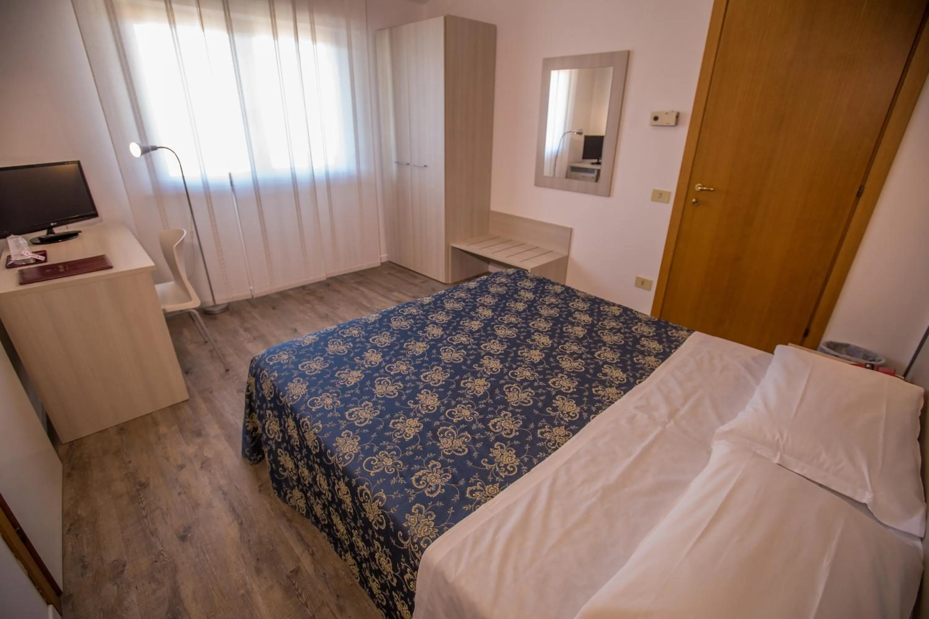 Photo of the whole room, Bed in Hotel Rossi