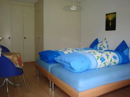 Photo of the whole room, Bed in Hotel Ristorante Schlössli