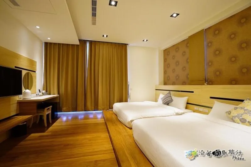 Bed in CHEN FENG HOMESTAY