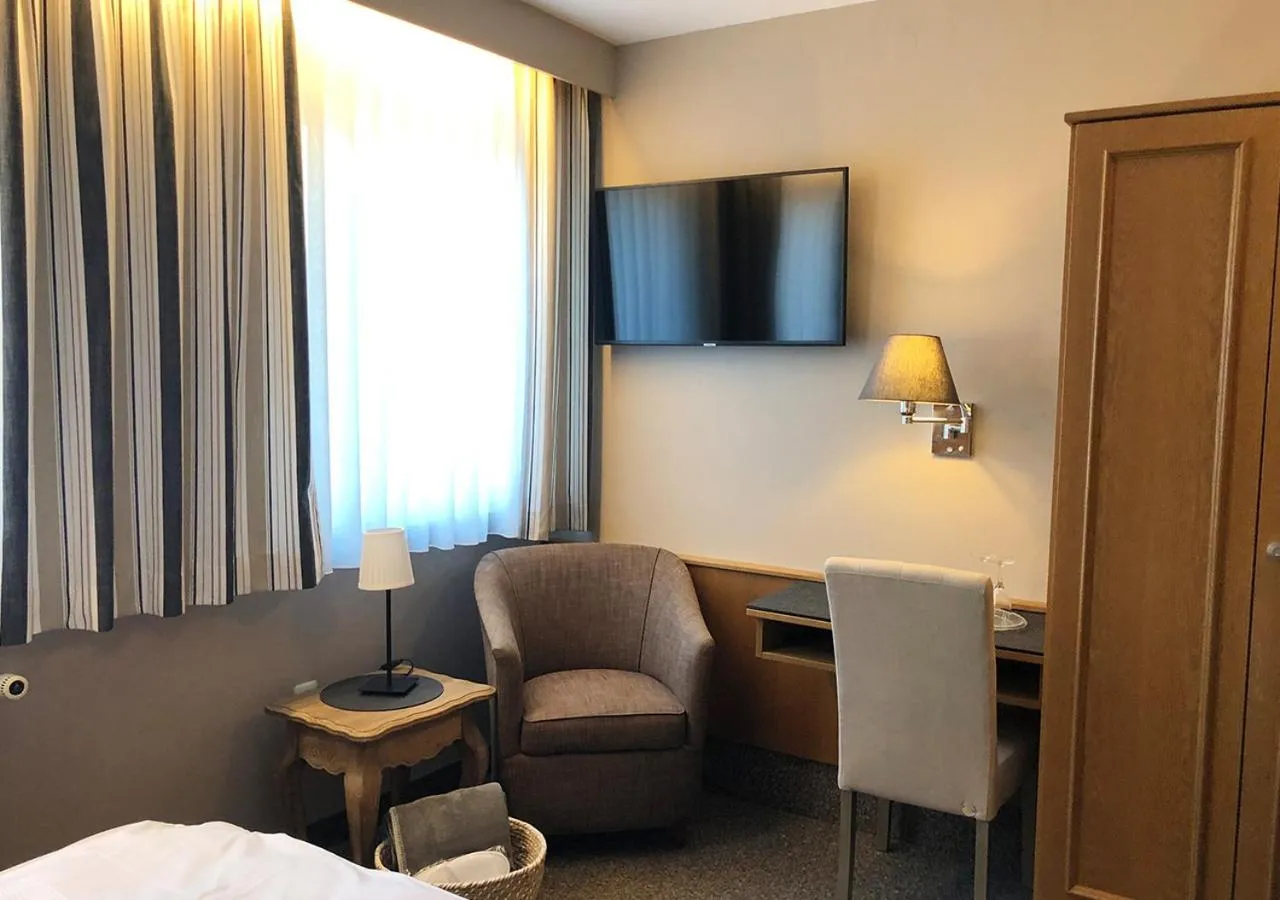 Bed in Mangolds Boutique Hotel & Fruehstuecksmeisterei